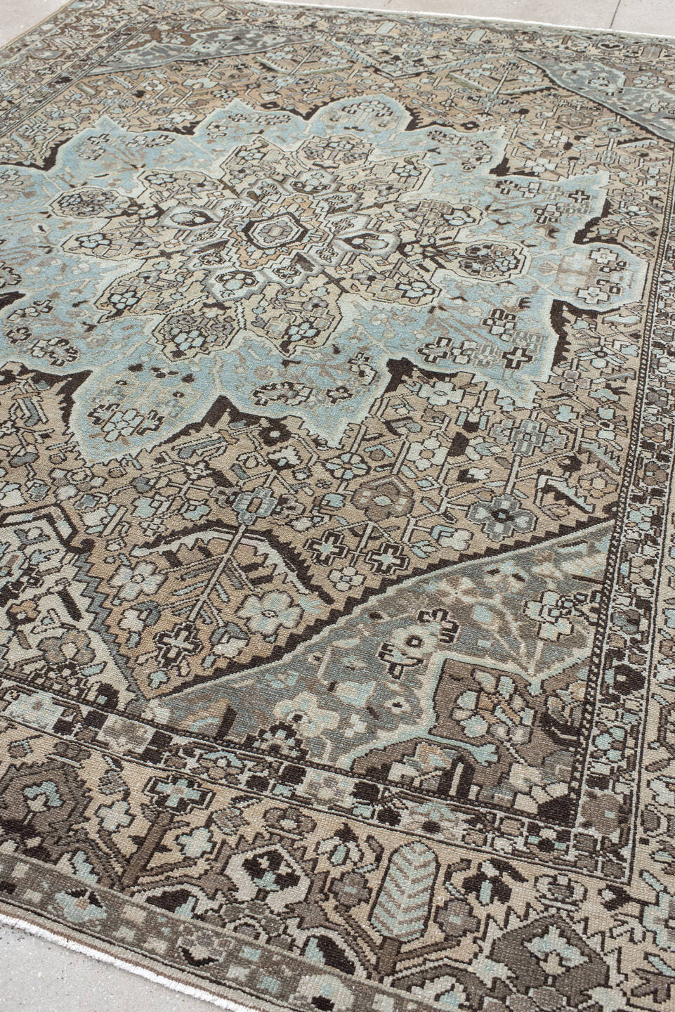 9' x 12' one-of-a-kind handmade antique Baktiary large size rug. Color palette: taupe, pale blue, ivory, charcoal, beige