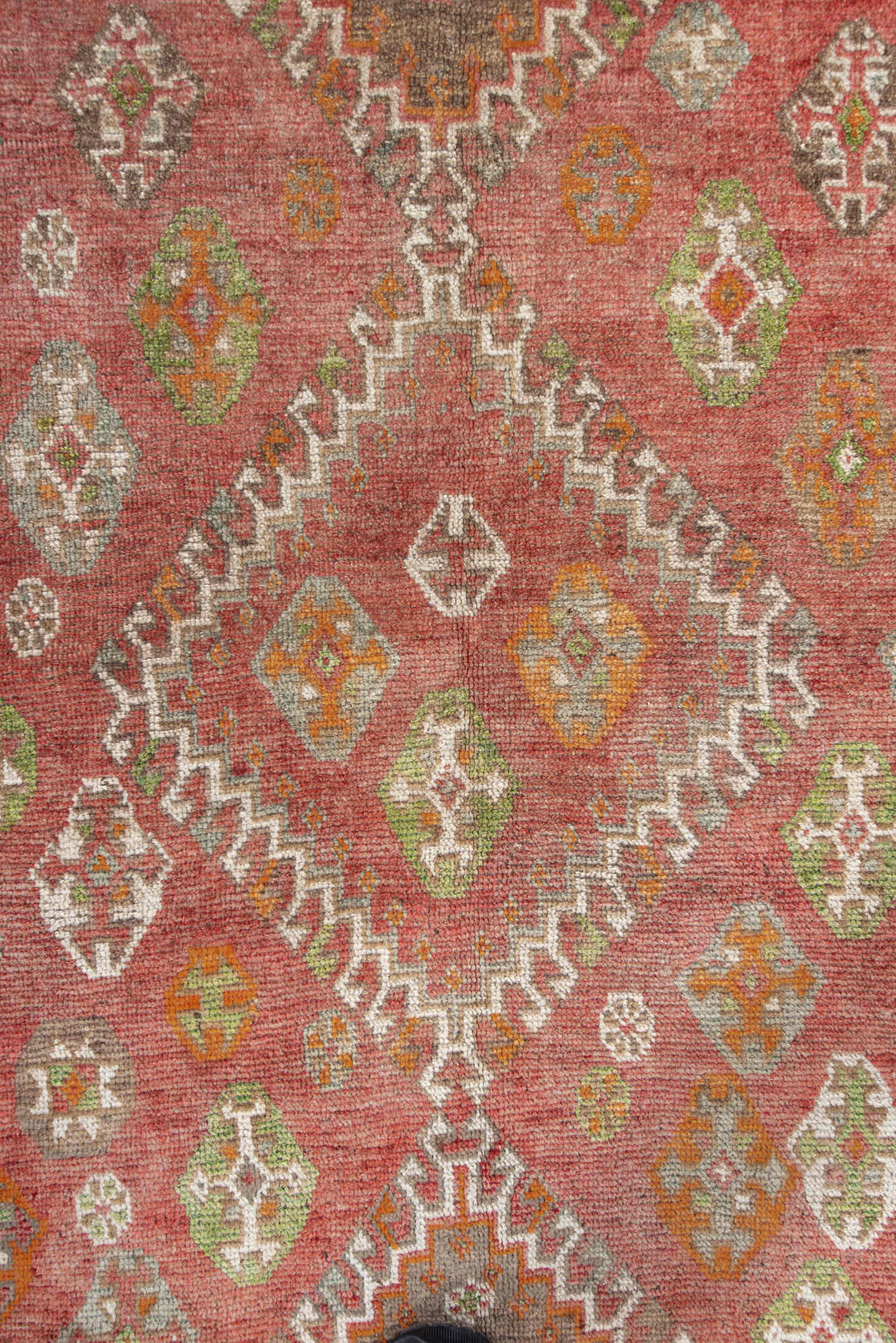 4' x 7' one-of-a-kind handmade antique Gabbe rug. Color palette: terra cotta, ivory, orange, sage, gray, taupe, rust