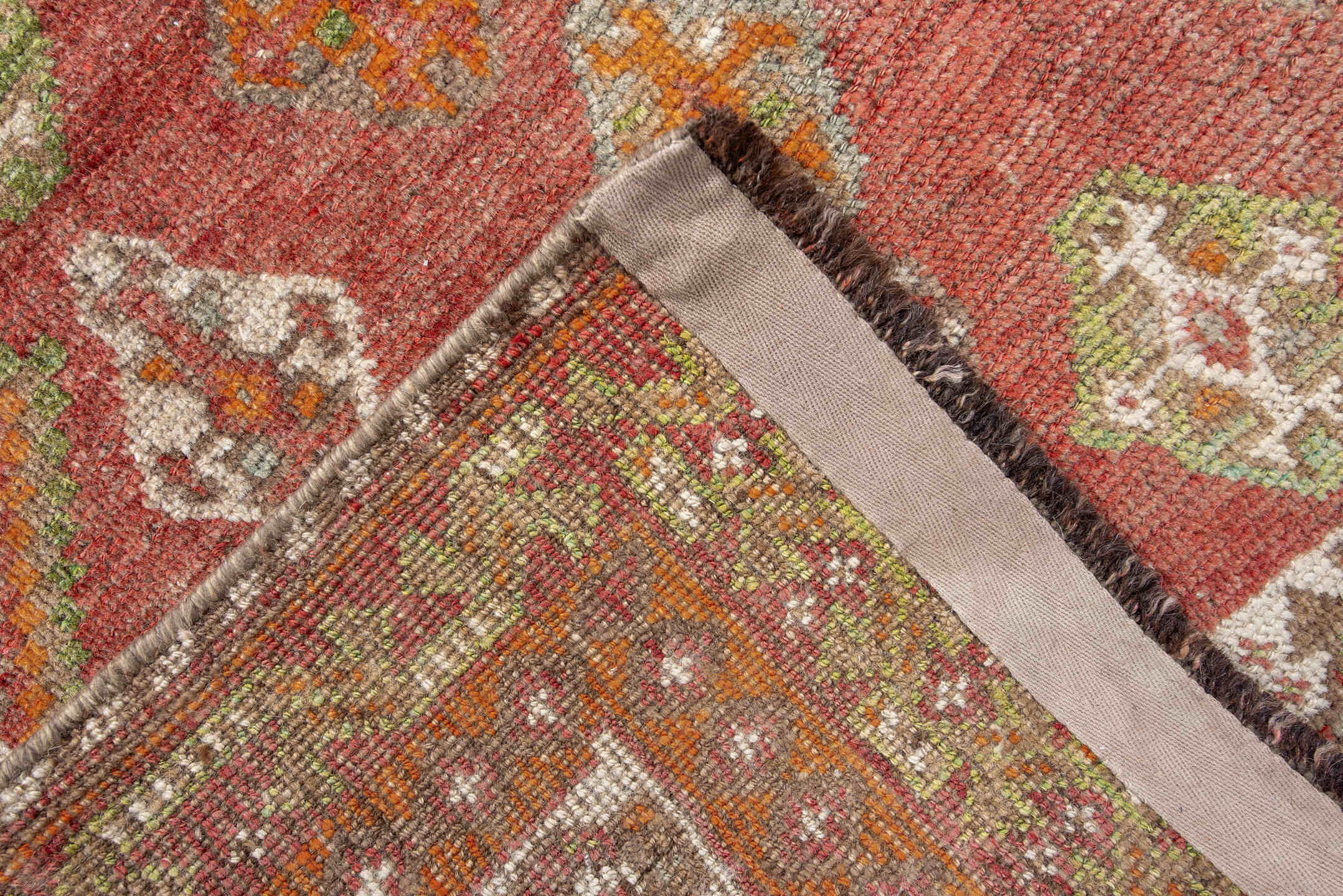 4' x 7' one-of-a-kind handmade vintage Gabbe rug. Color palette: brown, gray, light gray, off-white, orange, pink