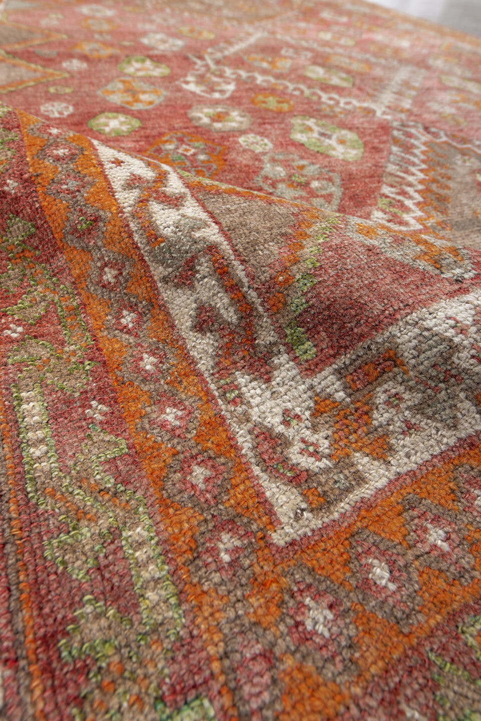 4' x 7' one-of-a-kind handmade antique Gabbe rug. Color palette: terra cotta, ivory, orange, sage, gray, taupe, rust