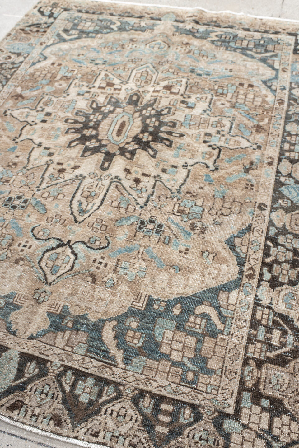 5' x 7' one-of-a-kind handmade vintage Baktiary rug. Color palette: ivory, taupe, aqua, brown, charcoal, cream, beige, gray