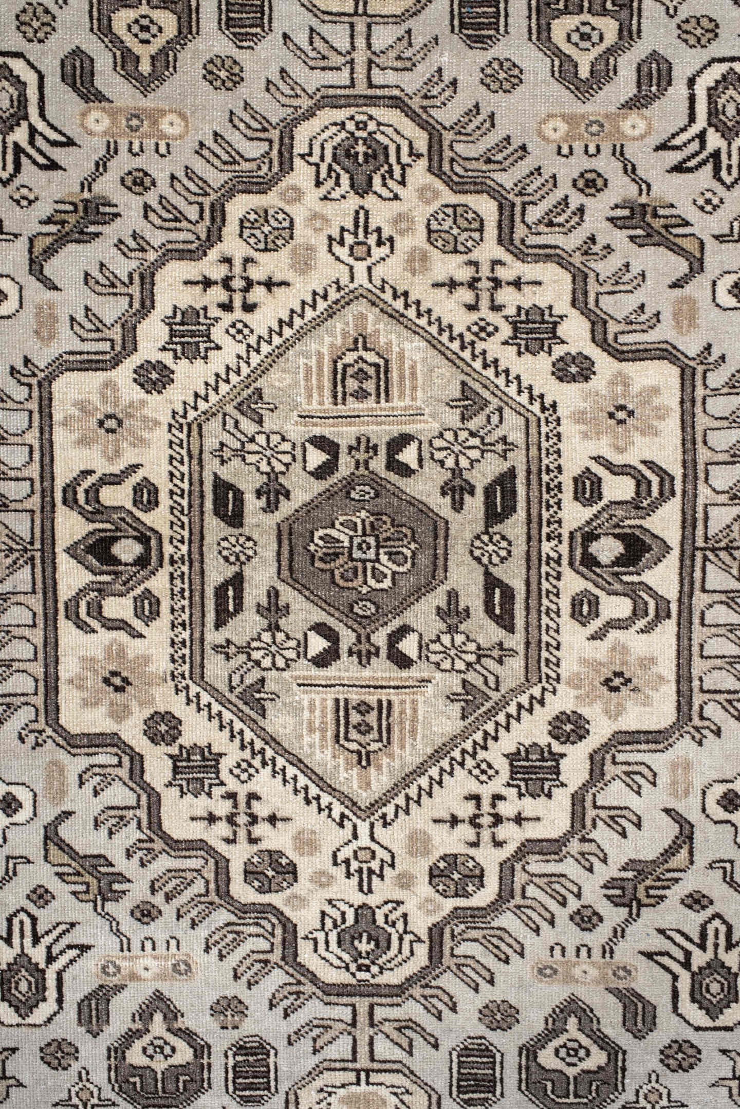 5' x 8' one-of-a-kind handmade antique medium size rug. Color palette: ivory, taupe, brown, charcoal, beige, gray, black