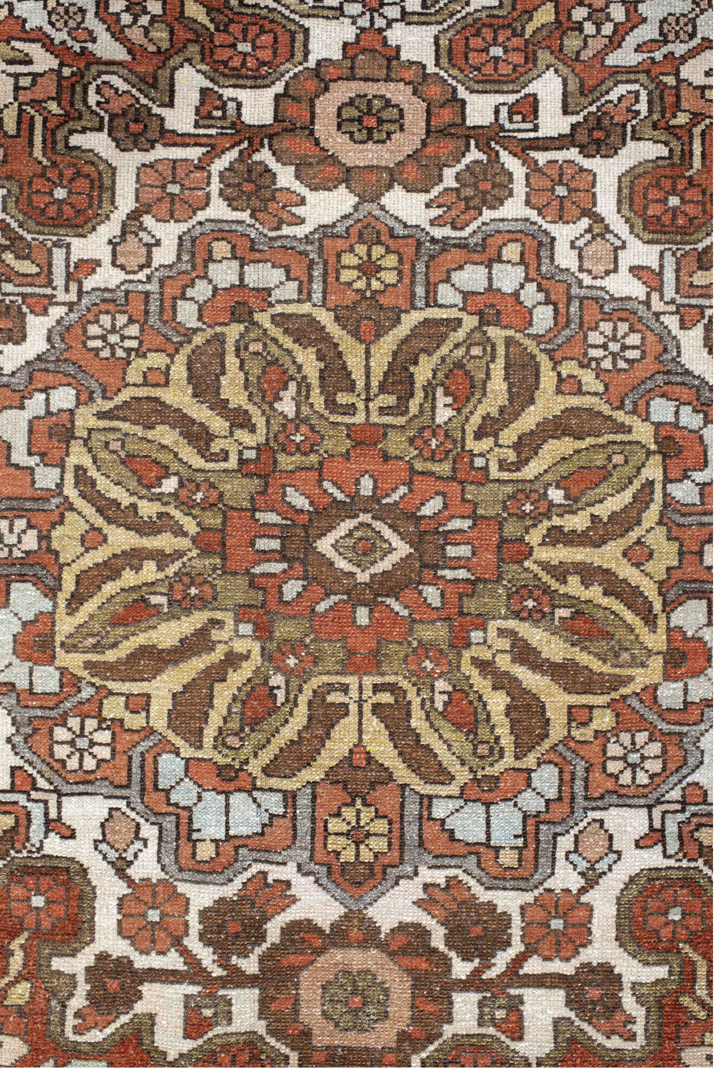 4' x 6' one-of-a-kind handmade vintage Baktiary small size rug. Color palette: ivory, rust, brown, sky blue, taupe, camel