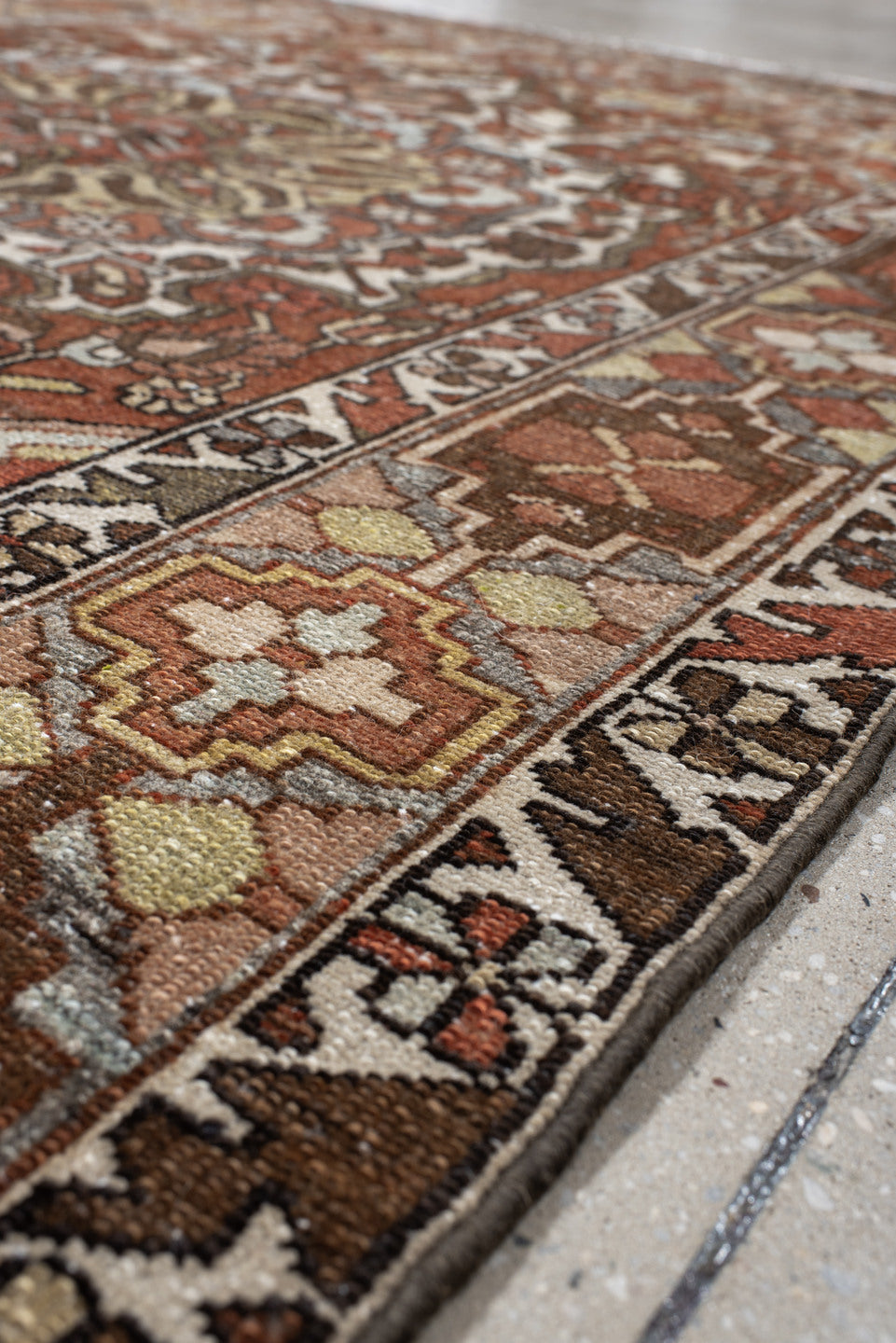 4' x 6' one-of-a-kind handmade vintage Baktiary small size rug. Color palette: ivory, rust, brown, sky blue, taupe, camel