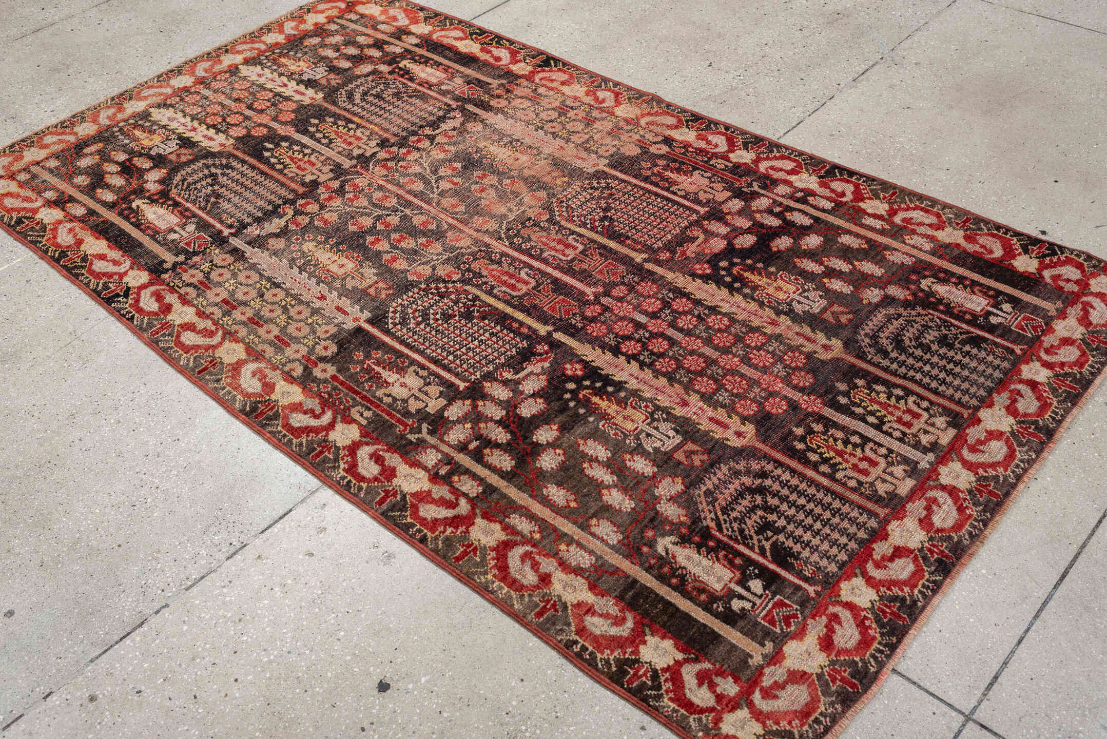 4' x 7' one-of-a-kind handmade vintage Anatolian rug. Color palette: charcoal, rust, ivory, rose, taupe, mahogany, black