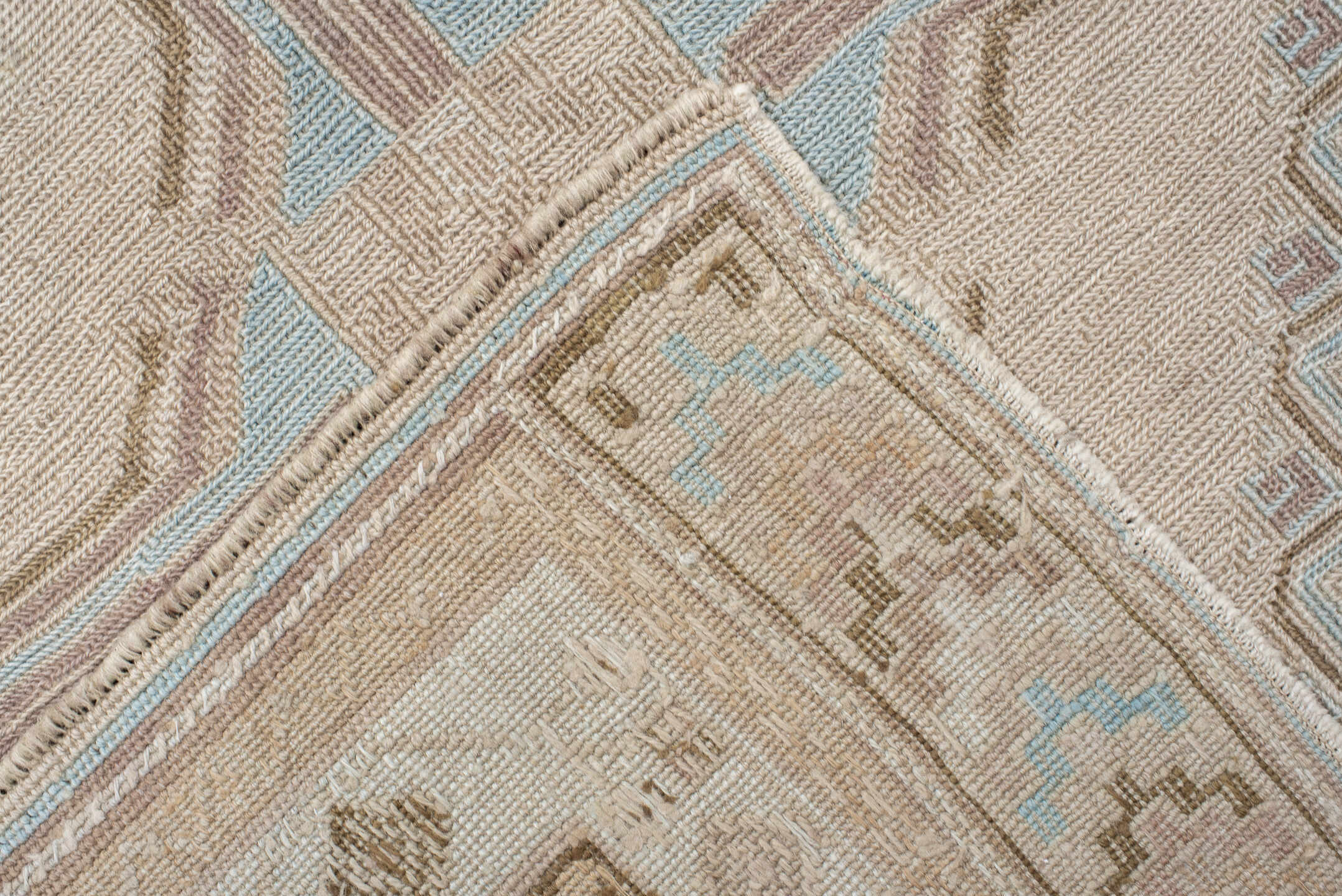 5' x 7' one-of-a-kind handmade antique Sumak rug. Color palette: ivory, light blue, taupe, beige, camel, gray