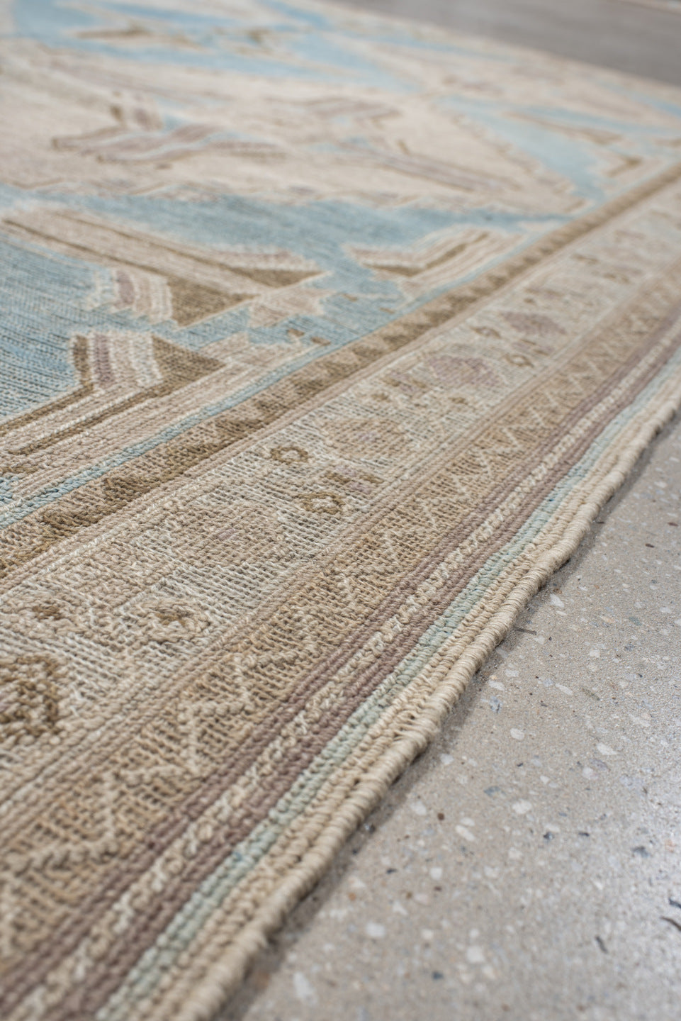 5' x 7' one-of-a-kind handmade antique Sumak rug. Color palette: ivory, light blue, taupe, beige, camel, gray
