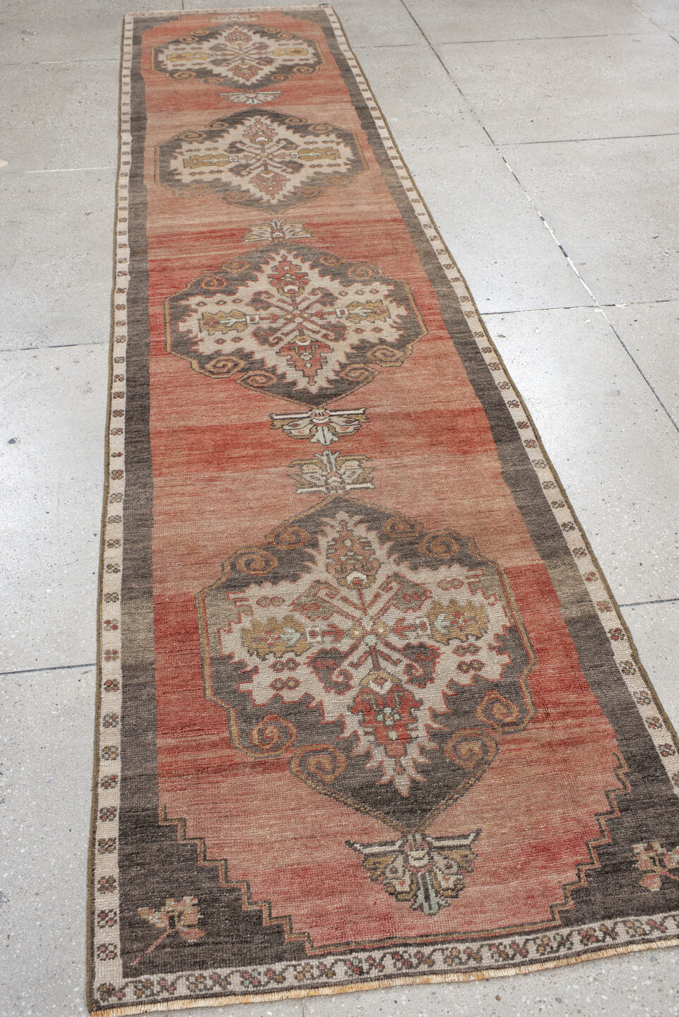 2' x 13' one-of-a-kind handmade vintage Anatol runner rug. Color palette: brown, gray, orange, pink, red, sienna