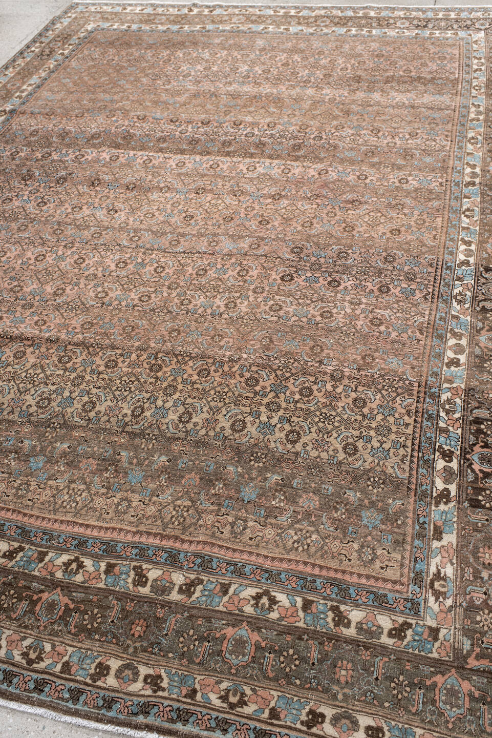 7' x 10' one-of-a-kind handmade vintage Bidjar large size rug. Color palette: rose, taupe, brown, ivory, light blue