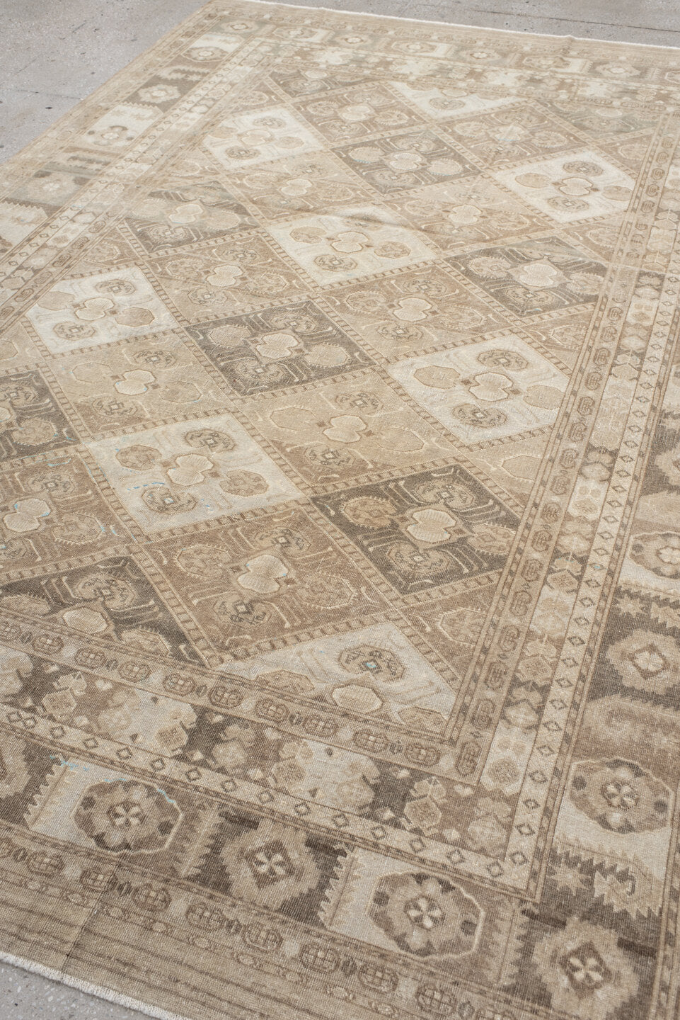 6' x 9' one-of-a-kind handmade antique Afghan medium size rug. Color palette: ivory, taupe, camel, beige, brown, sand