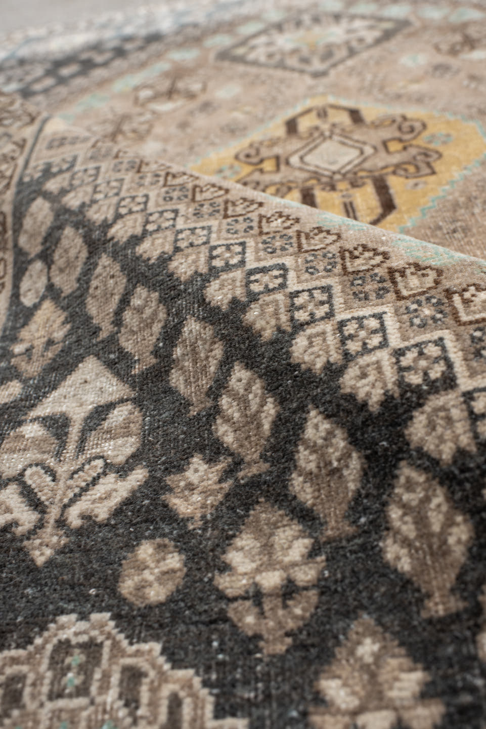 3' x 5' one-of-a-kind handmade vintage Shiraz small size rug. Color palette: taupe, charcoal, ivory, brown, turquoise, cream