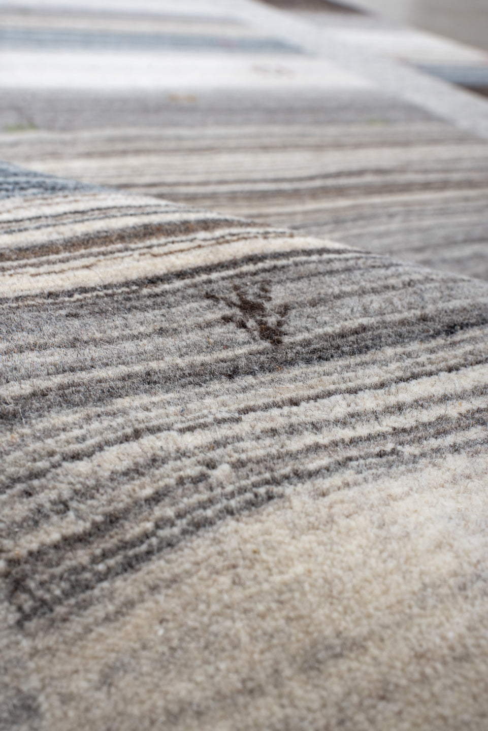 5' x 7' one-of-a-kind handmade vintage Gabbe rug. Color palette: black, blue, brown, charcoal, dark gray, dim gray