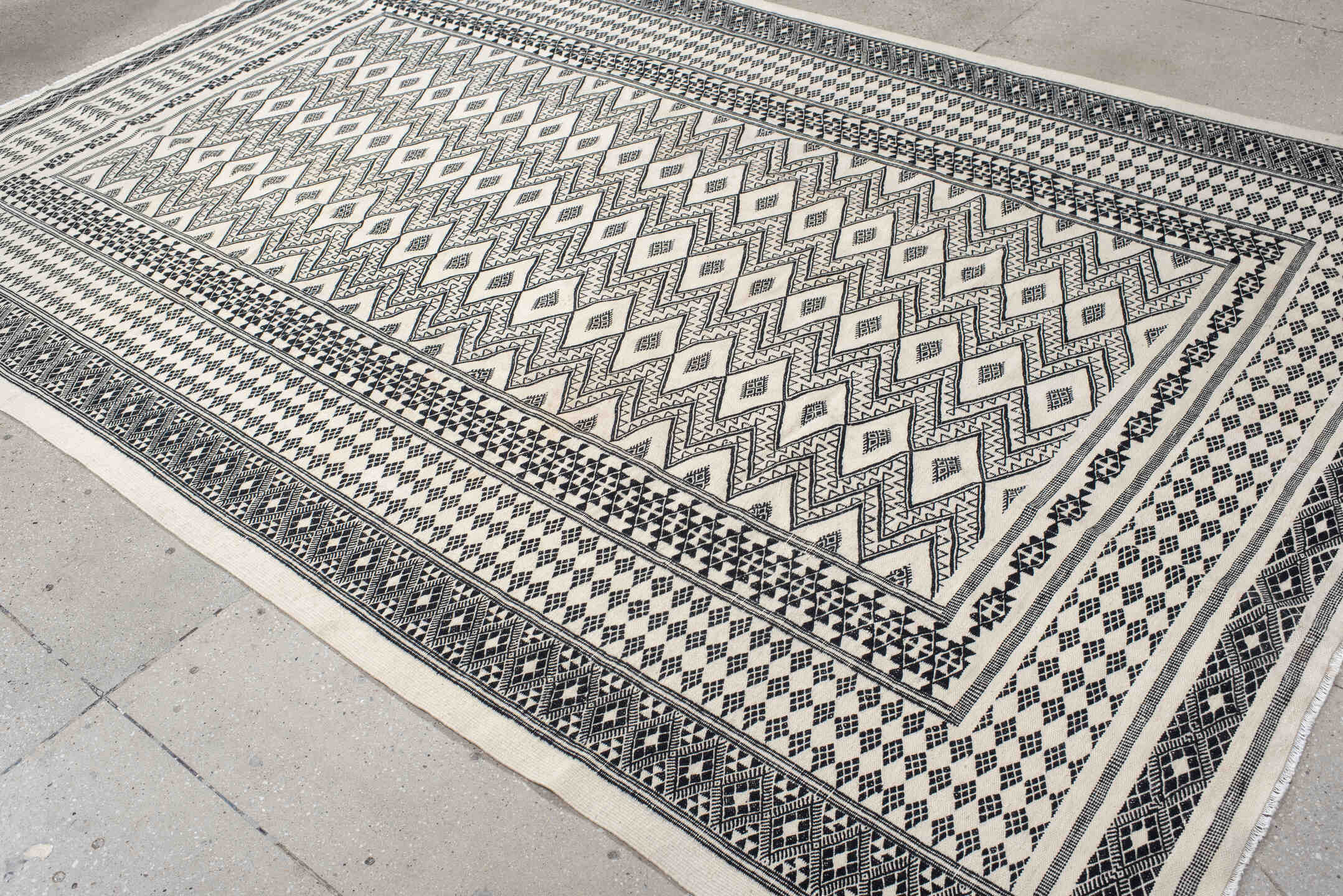 7' x 10' one-of-a-kind handmade vintage Kilim large size rug. Color palette: ivory, charcoal, black, gray