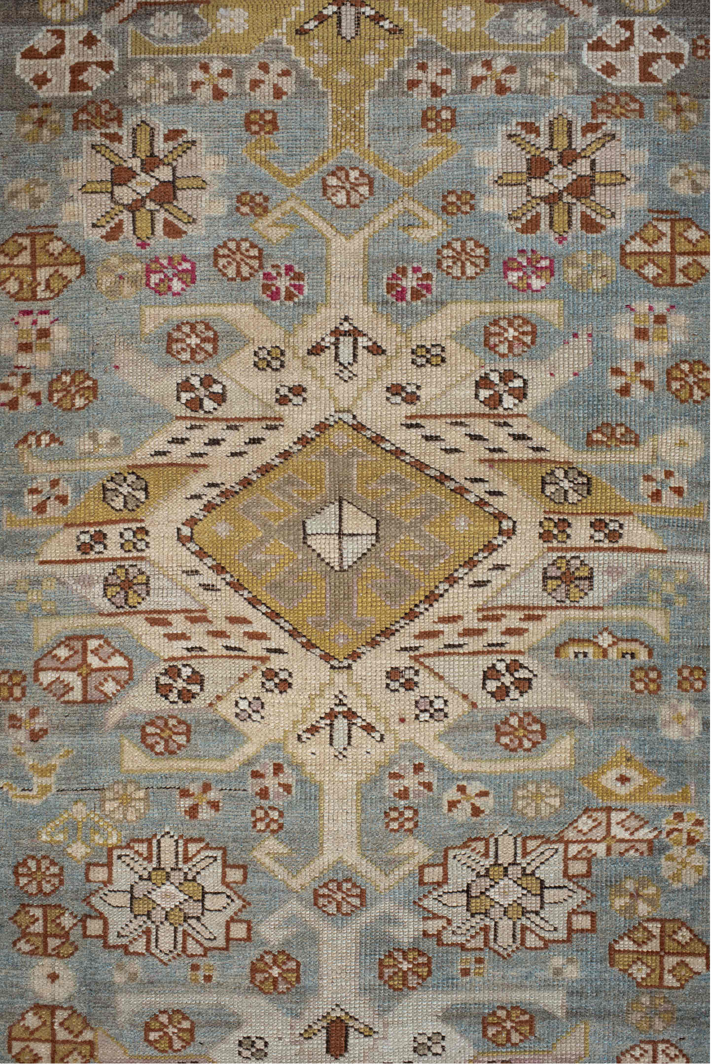 3' x 10' one-of-a-kind handmade vintage Caucasian runner rug. Color palette: black, brown, dim gray, gray, light gray, pink