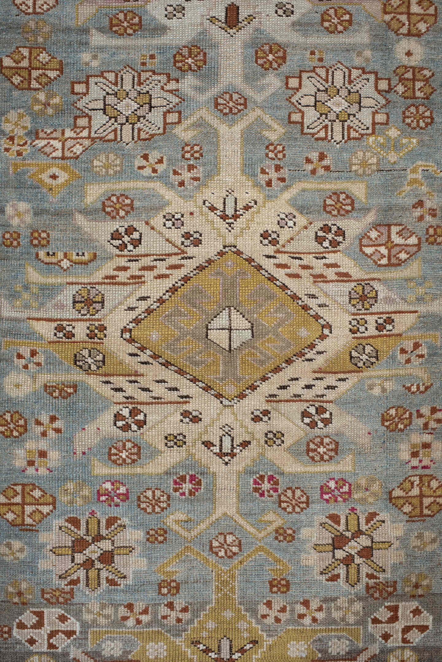 3' x 10' one-of-a-kind handmade antique Caucasian runner rug. Color palette: ivory, pale blue, taupe, rose, rust, gold, sage