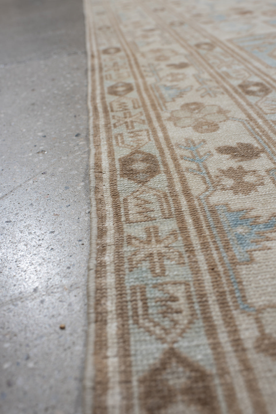 4' x 8' one-of-a-kind handmade vintage Sivas rug. Color palette: gray, light gray, off-white, blue, brown, pink, silver