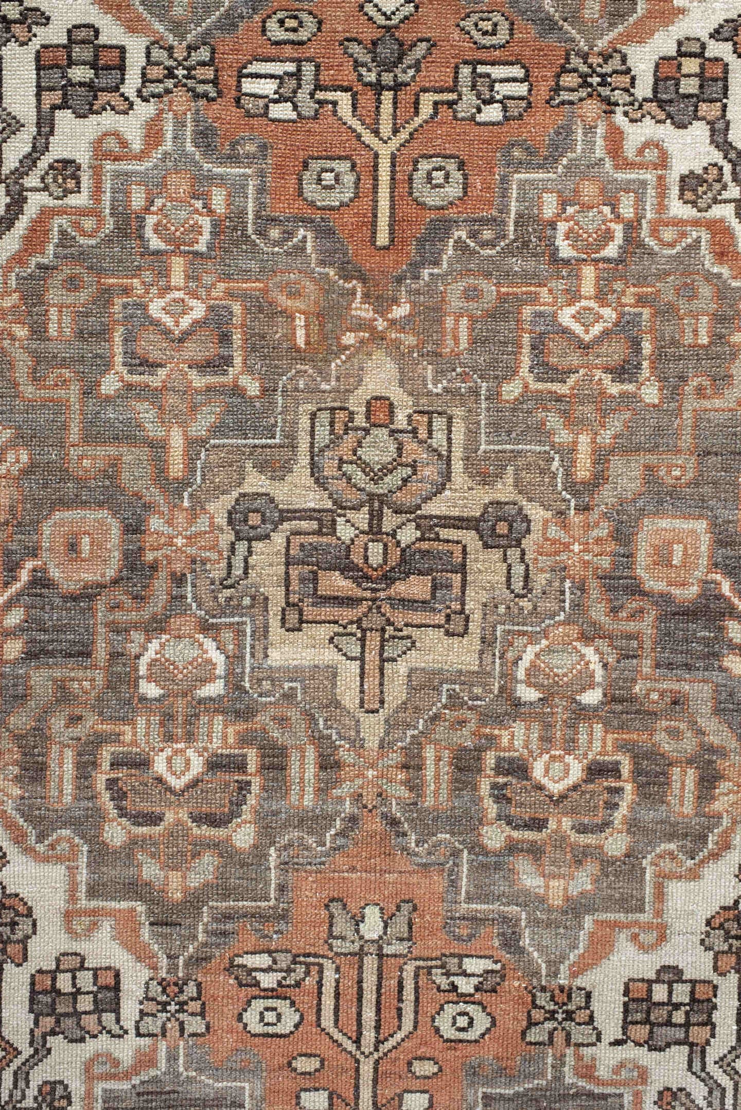4' x 7' one-of-a-kind handmade vintage Baktiary rug. Color palette: taupe, terra cotta, ivory, slate, camel, charcoal, rose