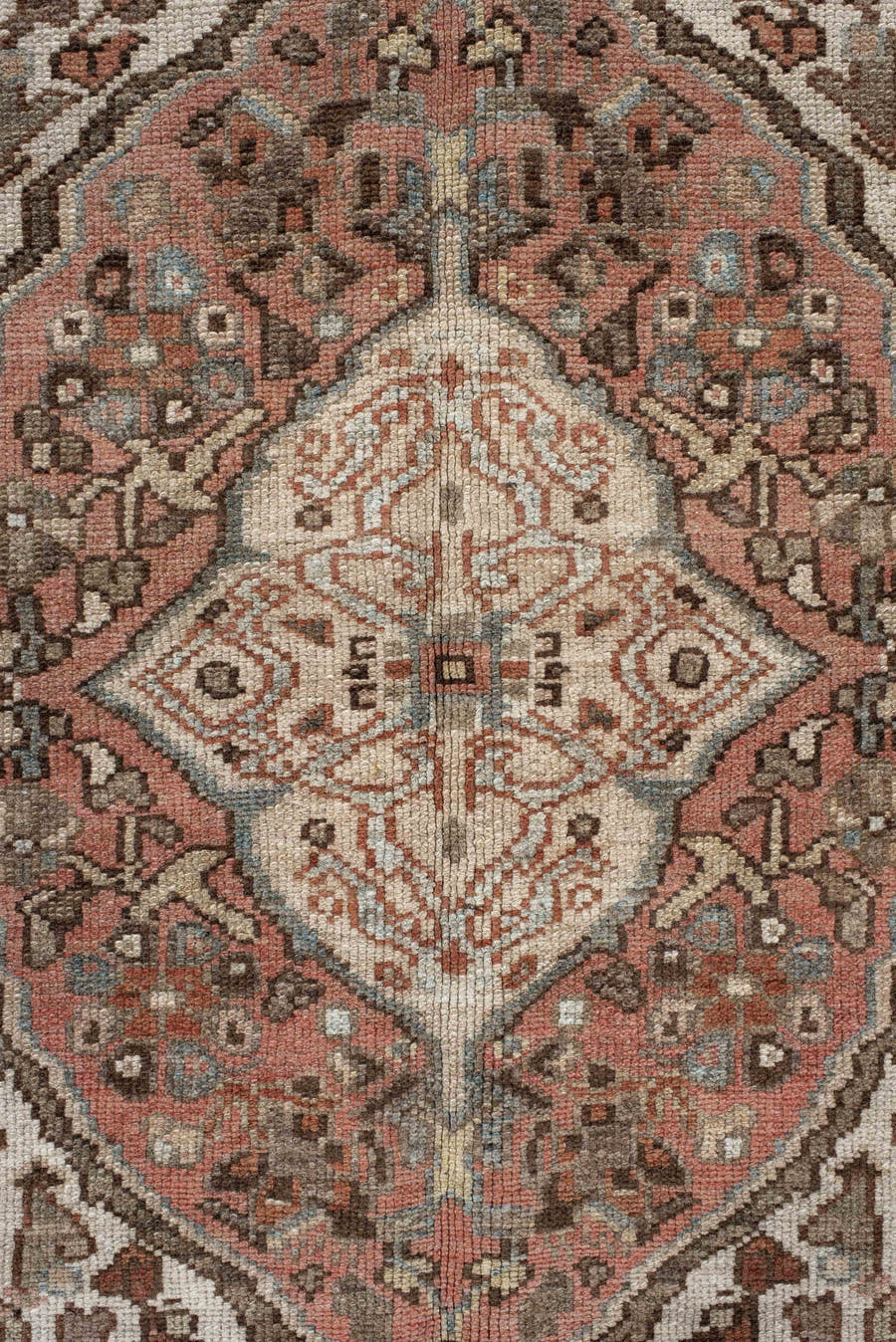 5' x 8' one-of-a-kind handmade antique Baktiary medium size rug. Color palette: ivory, dusty blue, rust, taupe, brown