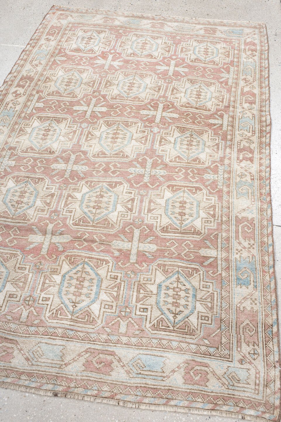 4' x 6' one-of-a-kind handmade vintage Kdh small size rug. Color palette: blush, ivory, pale blue, taupe, sand, pink