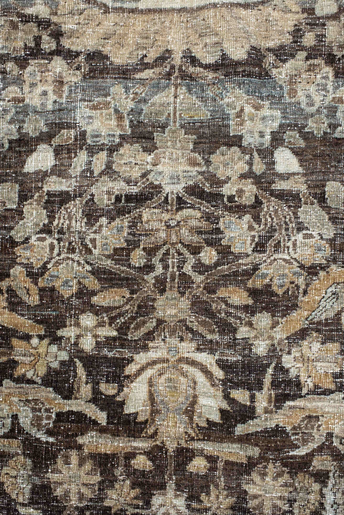 4' x 7' one-of-a-kind handmade vintage Baktiary rug. Color palette: ivory, charcoal, taupe, slate, camel, brown, beige, gray