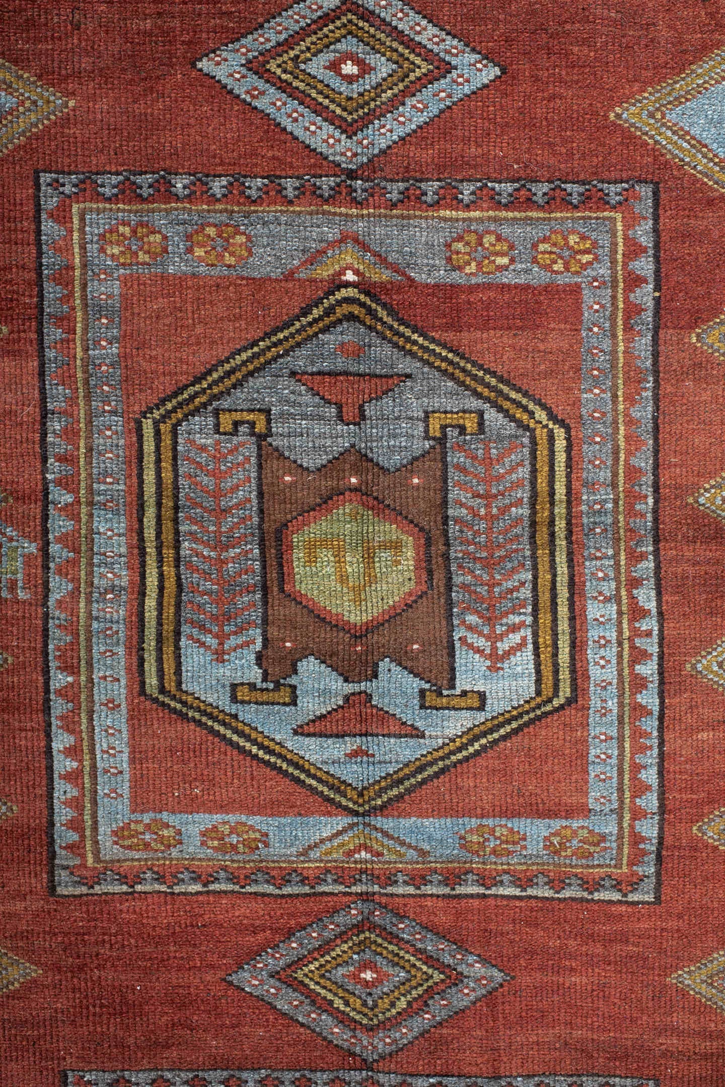 5' x 10' one-of-a-kind handmade antique NW Persian medium size rug. Color palette: rust, ivory, sky blue, camel, charcoal