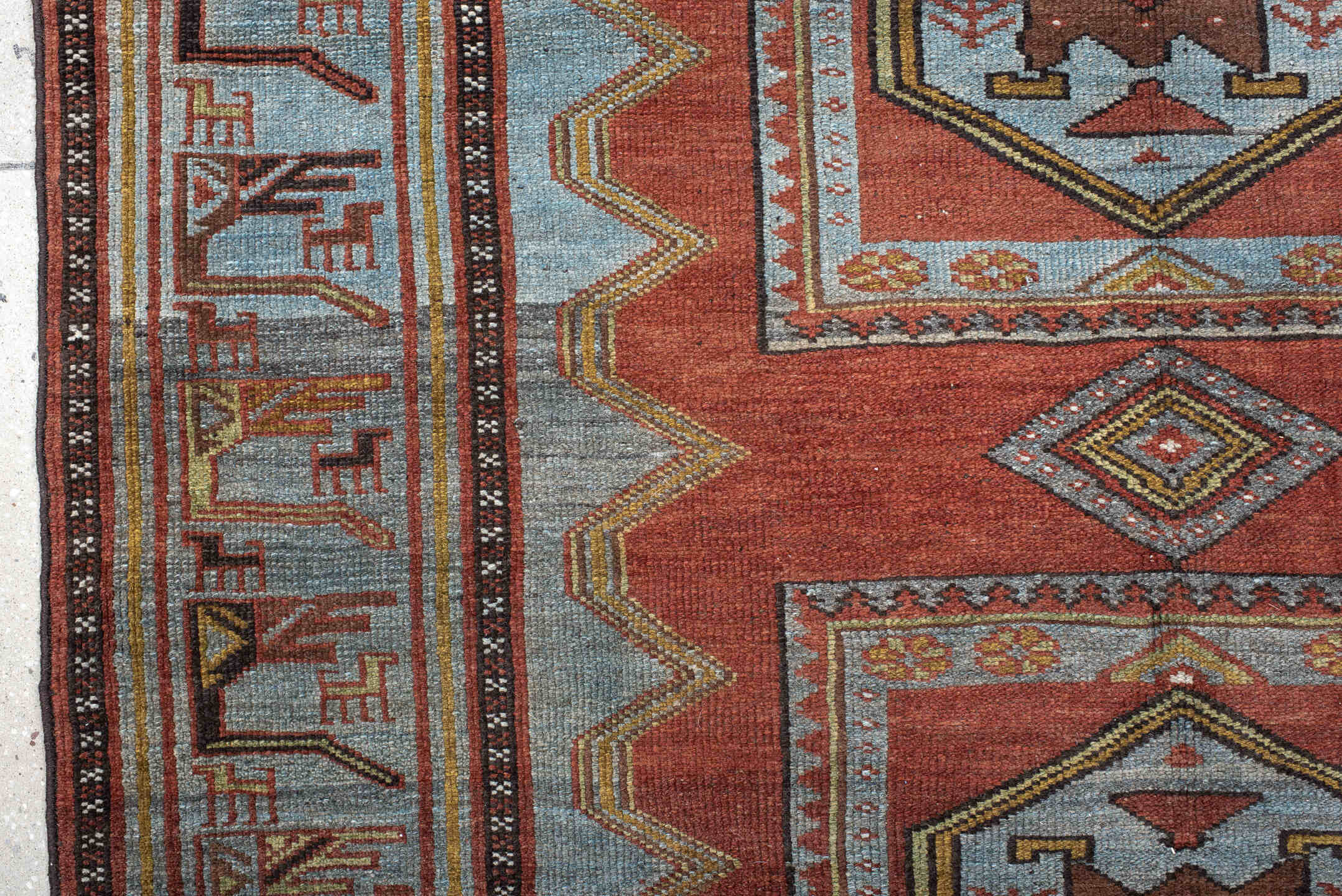 5' x 10' one-of-a-kind handmade antique NW Persian medium size rug. Color palette: rust, ivory, sky blue, camel, charcoal