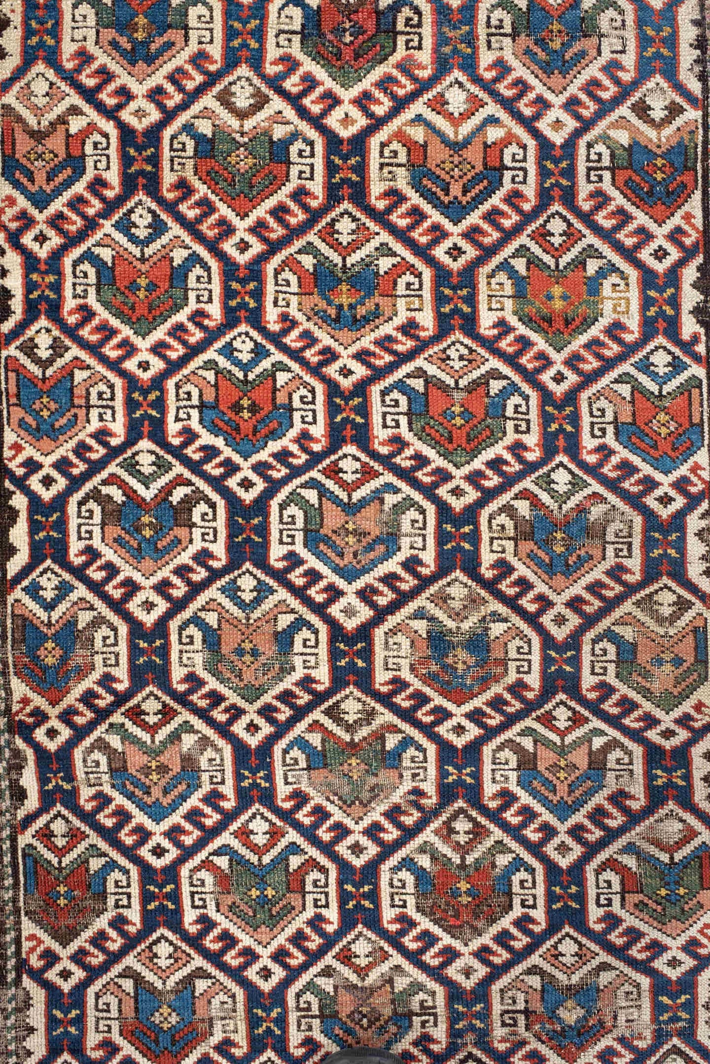3' x 9' one-of-a-kind handmade antique Shirvan runner rug. Color palette: navy, ivory, rust, brick, camel, slate, crimson