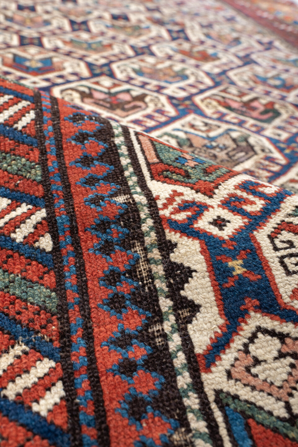 3' x 9' one-of-a-kind handmade vintage Shirvan runner rug. Color palette: antiquewhite, beige, black, blue, brown, burlywood