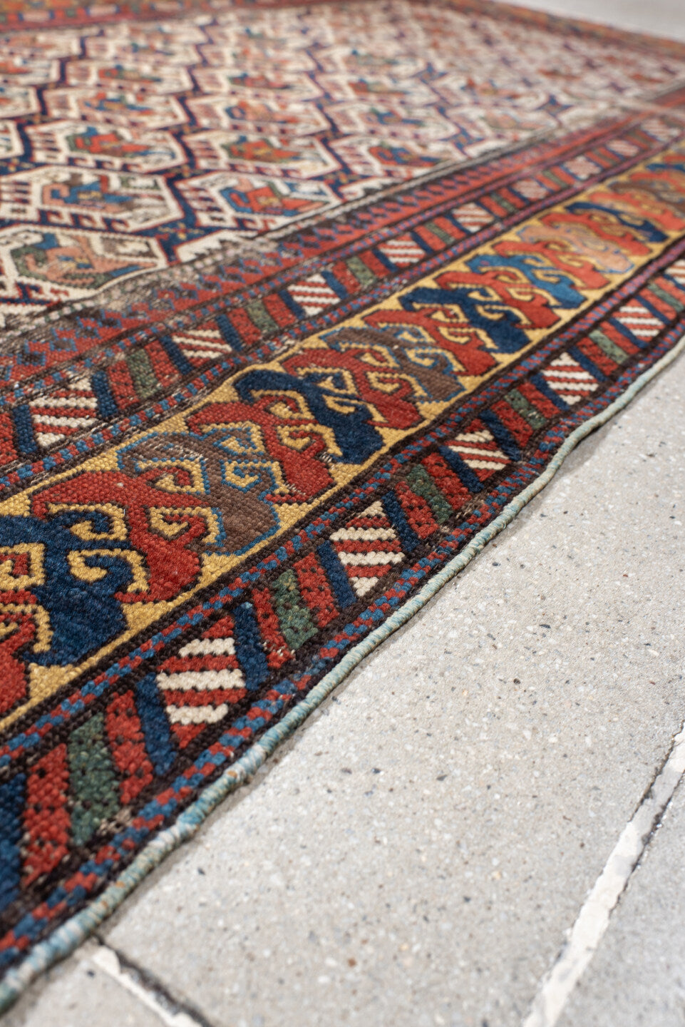 3' x 9' one-of-a-kind handmade vintage Shirvan runner rug. Color palette: antiquewhite, beige, black, blue, brown, burlywood