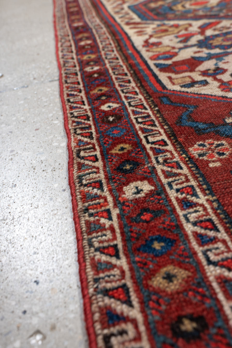 4' x 6' one-of-a-kind handmade vintage small size rug. Color palette: ivory, red, navy, cobalt, rust, camel, brown, blue
