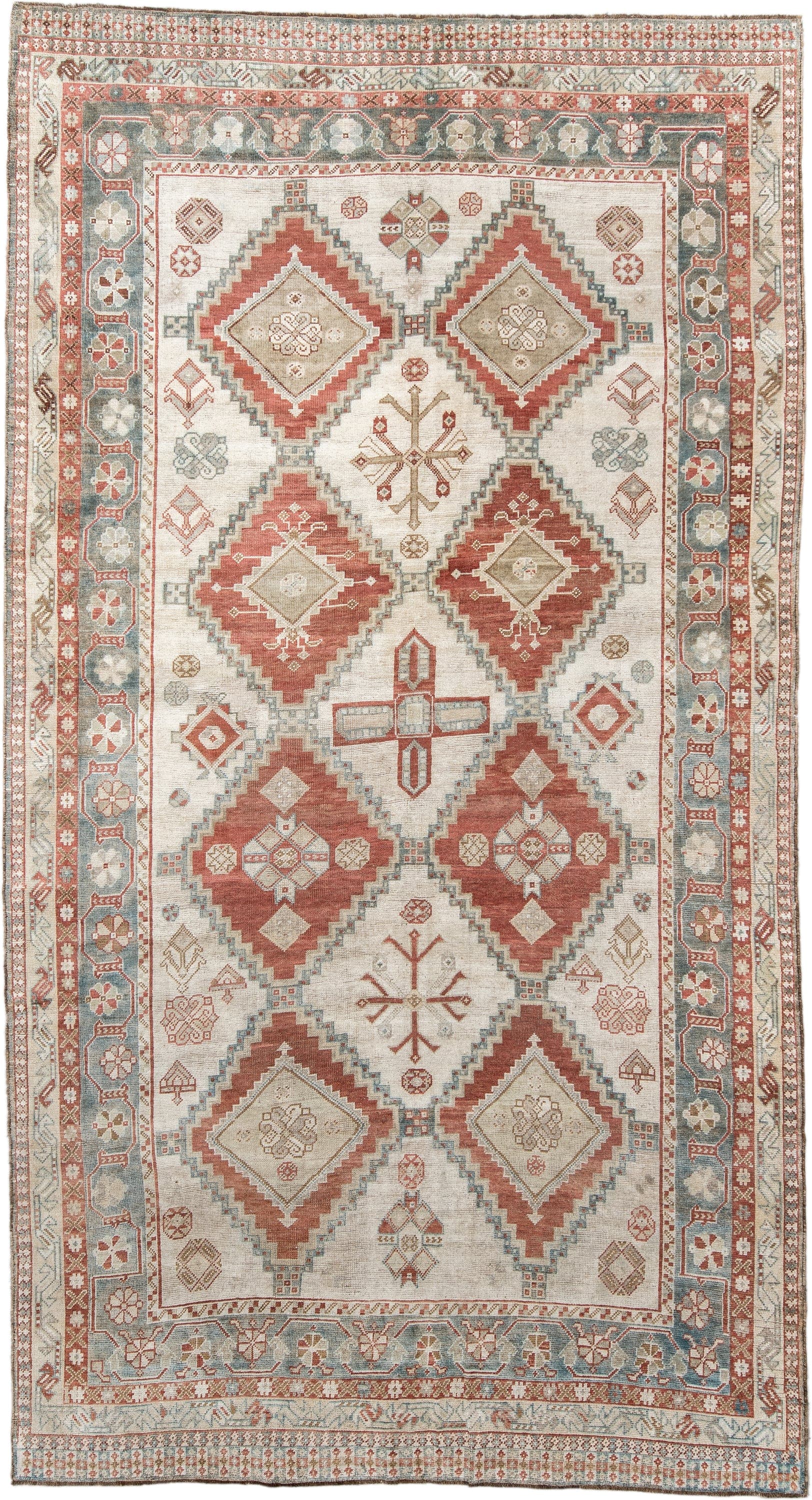 5' x 10' one-of-a-kind handmade vintage Shiraz medium size rug. Color palette: ivory, terra cotta, sky blue, rust, beige