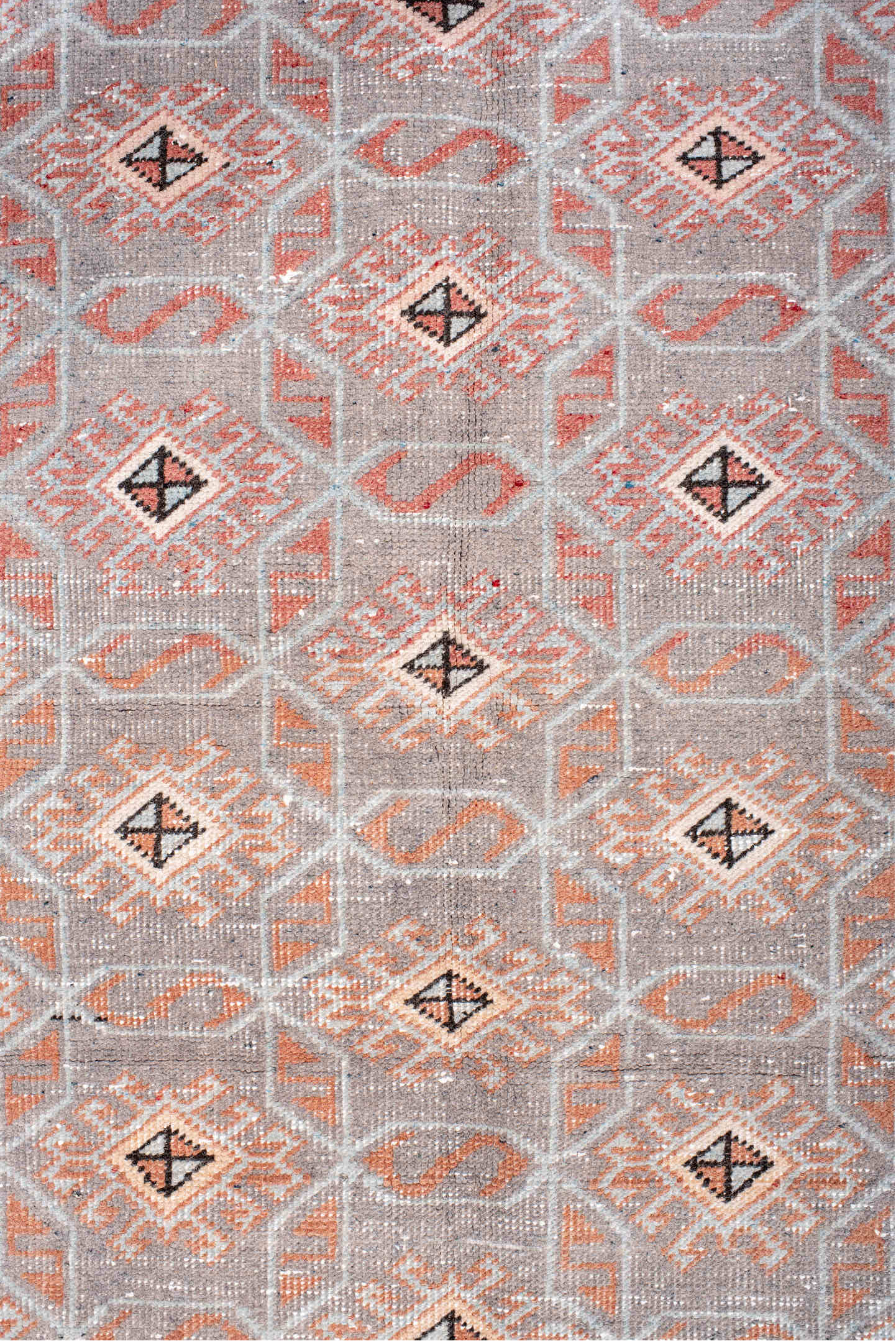 4' x 7' one-of-a-kind handmade vintage Sparta rug. Color palette: salmon, gray, ivory, charcoal, blush, pink, black