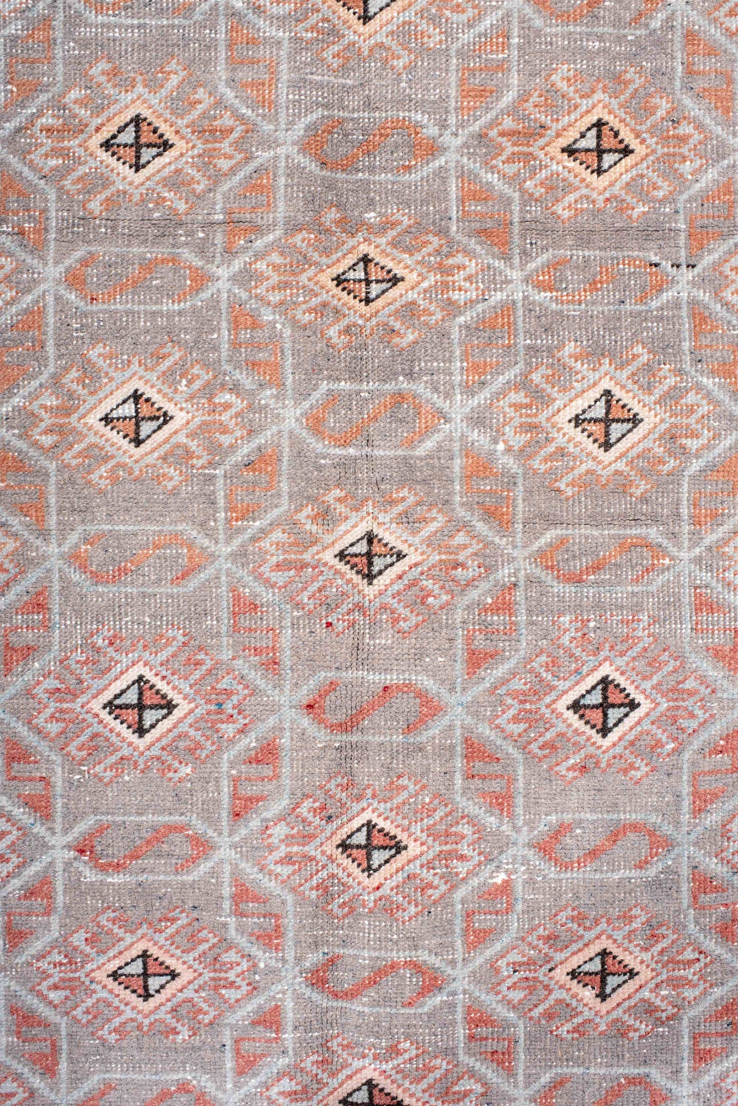 4' x 7' one-of-a-kind handmade vintage Sparta rug. Color palette: salmon, gray, ivory, charcoal, blush, pink, black