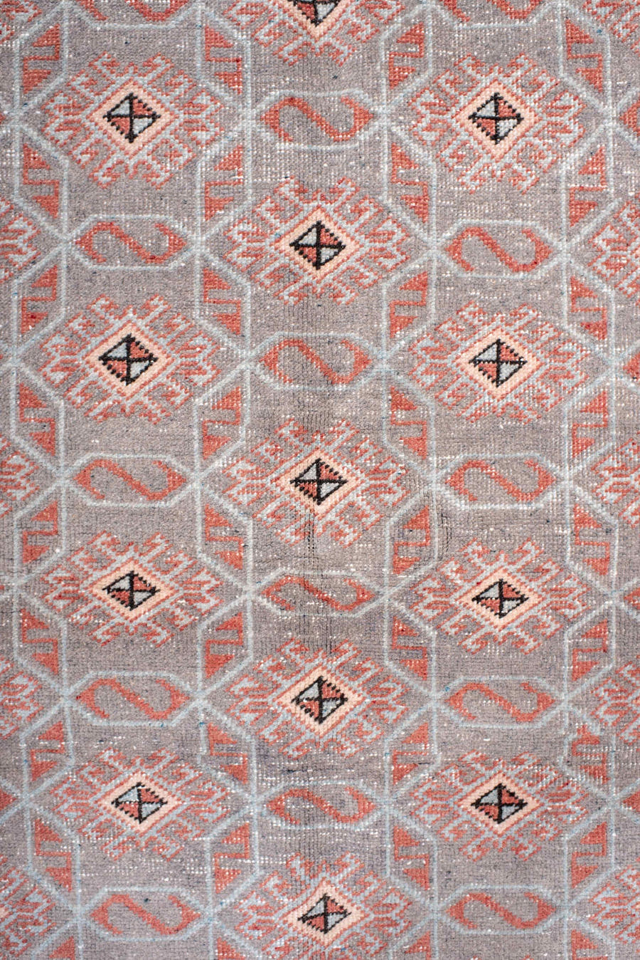 4' x 7' one-of-a-kind handmade vintage Sparta rug. Color palette: salmon, gray, ivory, charcoal, rose, taupe, pink, black