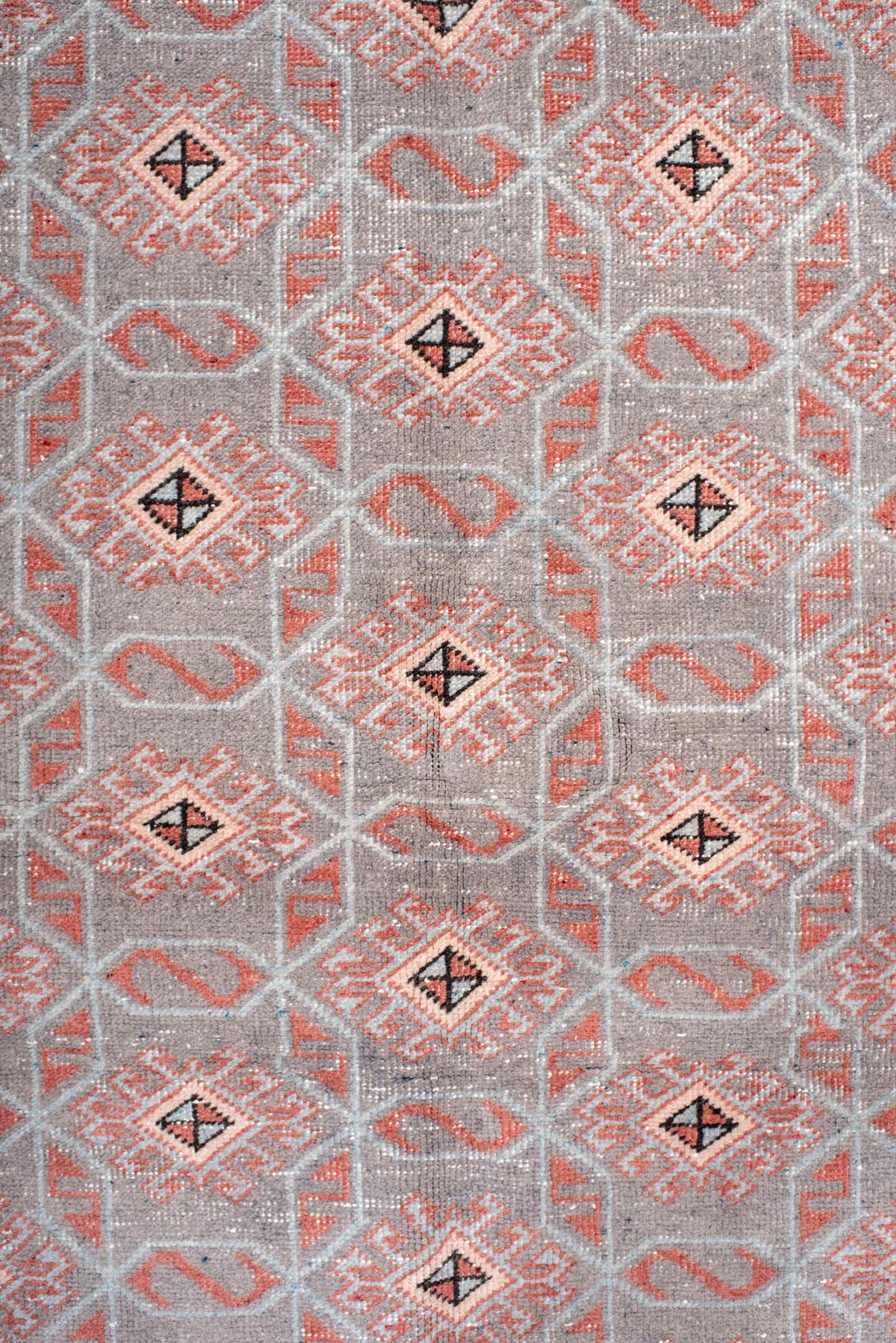 4' x 7' one-of-a-kind handmade vintage Sparta rug. Color palette: salmon, gray, ivory, charcoal, rose, taupe, pink, black