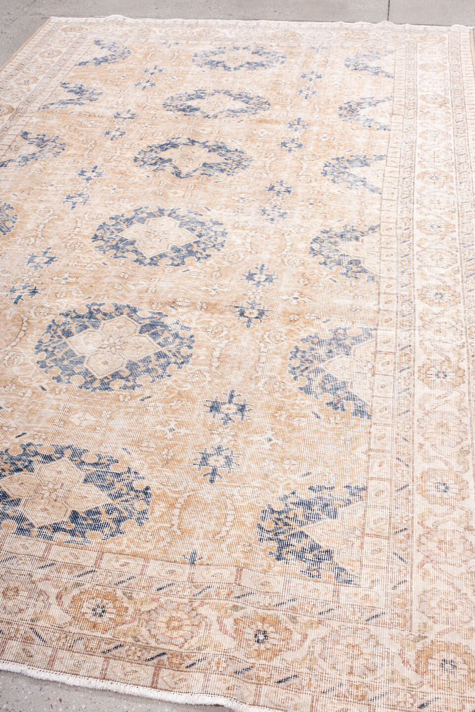 6' x 10' one-of-a-kind handmade vintage Sparta large size rug. Color palette: ivory, peach, beige, indigo, taupe, camel
