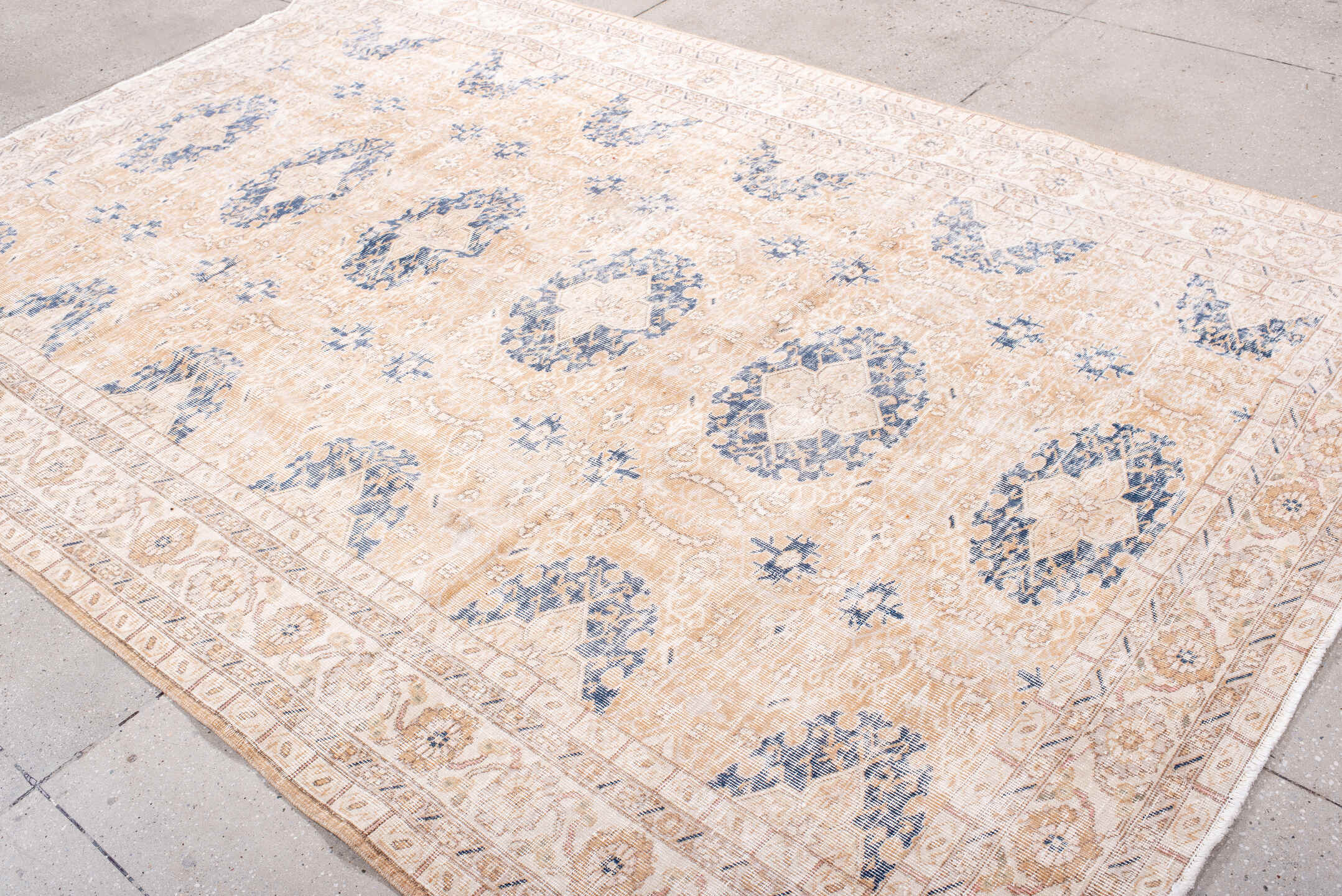 6' x 10' one-of-a-kind handmade vintage Sparta large size rug. Color palette: ivory, peach, beige, indigo, taupe, camel