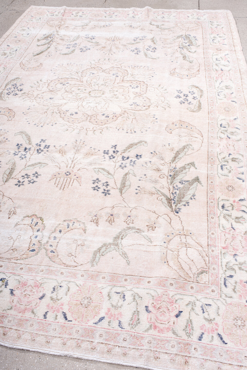 6' x 10' one-of-a-kind handmade vintage Sparta large size rug. Color palette: blush, ivory, pale pink, sage, dusty blue