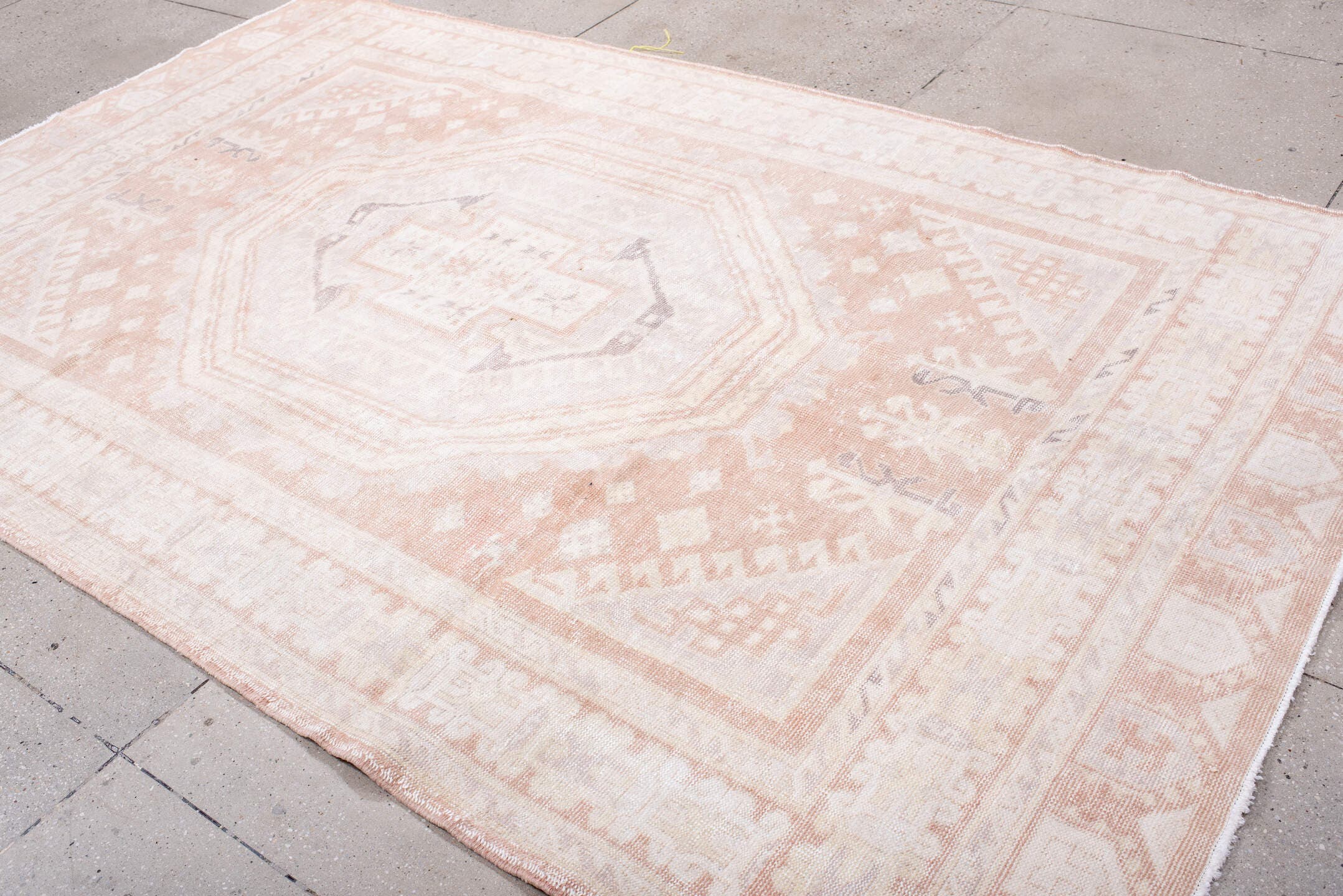 6' x 10' one-of-a-kind handmade vintage Sparta large size rug. Color palette: ivory, blush, peach, taupe, pale gray, pink