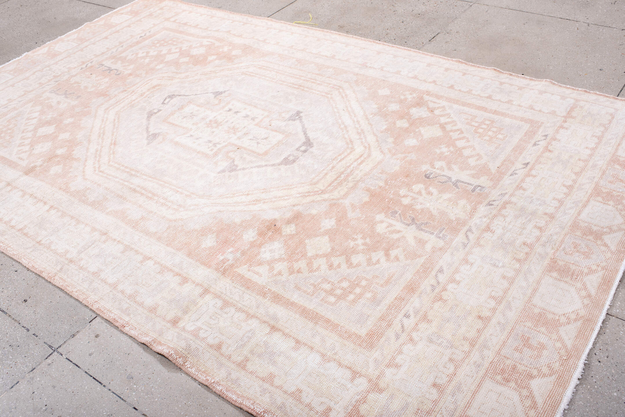6' x 10' one-of-a-kind handmade vintage Sparta large size rug. Color palette: ivory, blush, peach, taupe, pale gray, pink