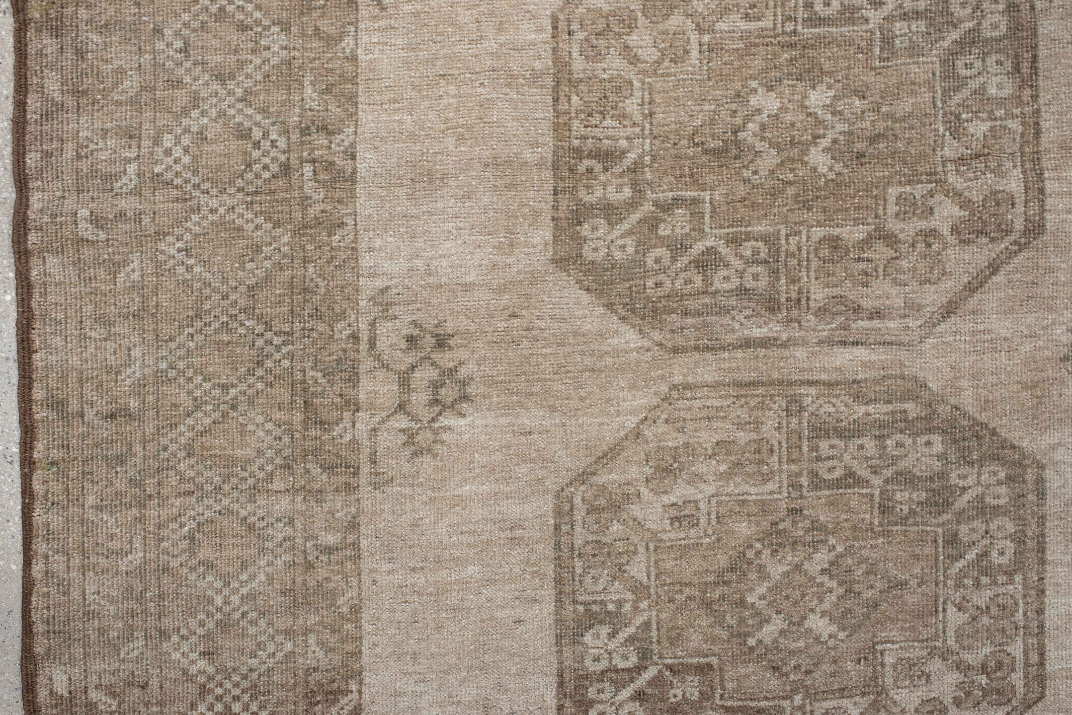 7' x 8' one-of-a-kind handmade antique Afghan rug. Color palette: ivory, taupe, camel, beige, sand, brown, gray