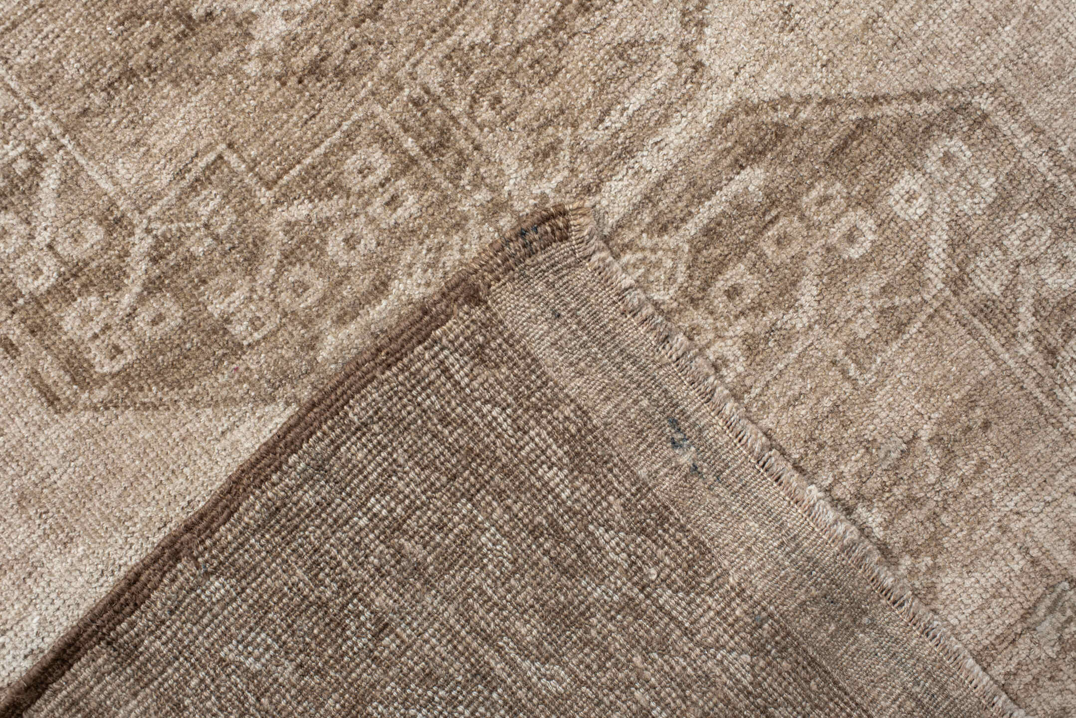 7' x 8' one-of-a-kind handmade antique Afghan rug. Color palette: ivory, taupe, camel, beige, sand, brown, gray