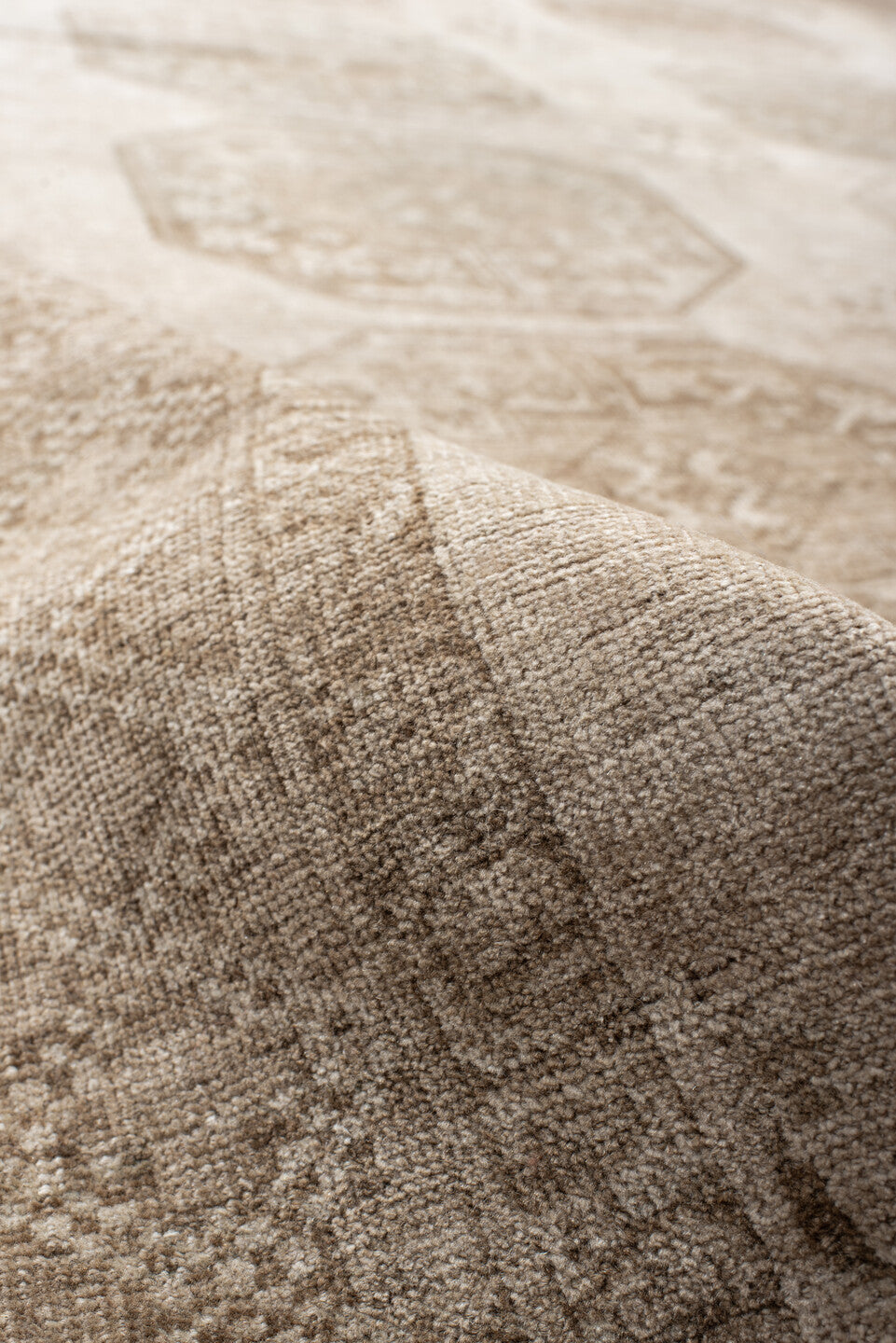 7' x 8' one-of-a-kind handmade antique Afghan rug. Color palette: ivory, taupe, camel, beige, sand, brown, gray