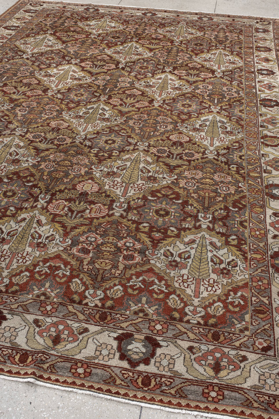 8' x 11' one-of-a-kind handmade antique Baktiary large size rug. Color palette: ivory, rust, brown, camel, taupe, sage, rose