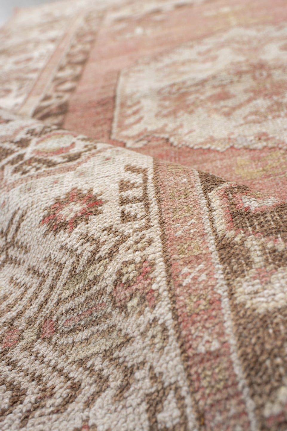 3' x 5' one-of-a-kind handmade antique Anatolian small size rug. Color palette: rose, ivory, taupe, brown, blush, camel