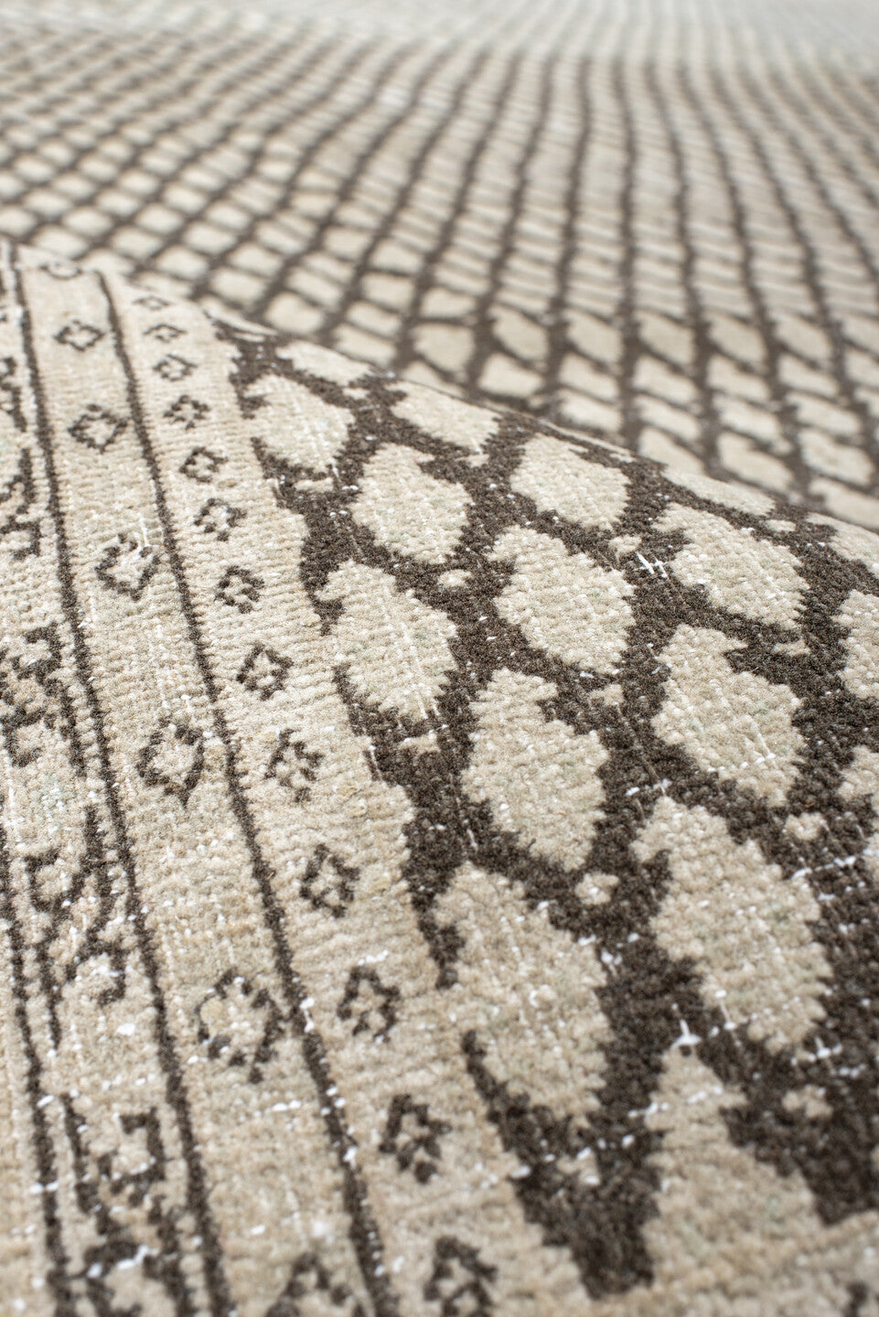 7' x 10' one-of-a-kind handmade vintage Mir large size rug. Color palette: black, floral white, gray, light gray, linen