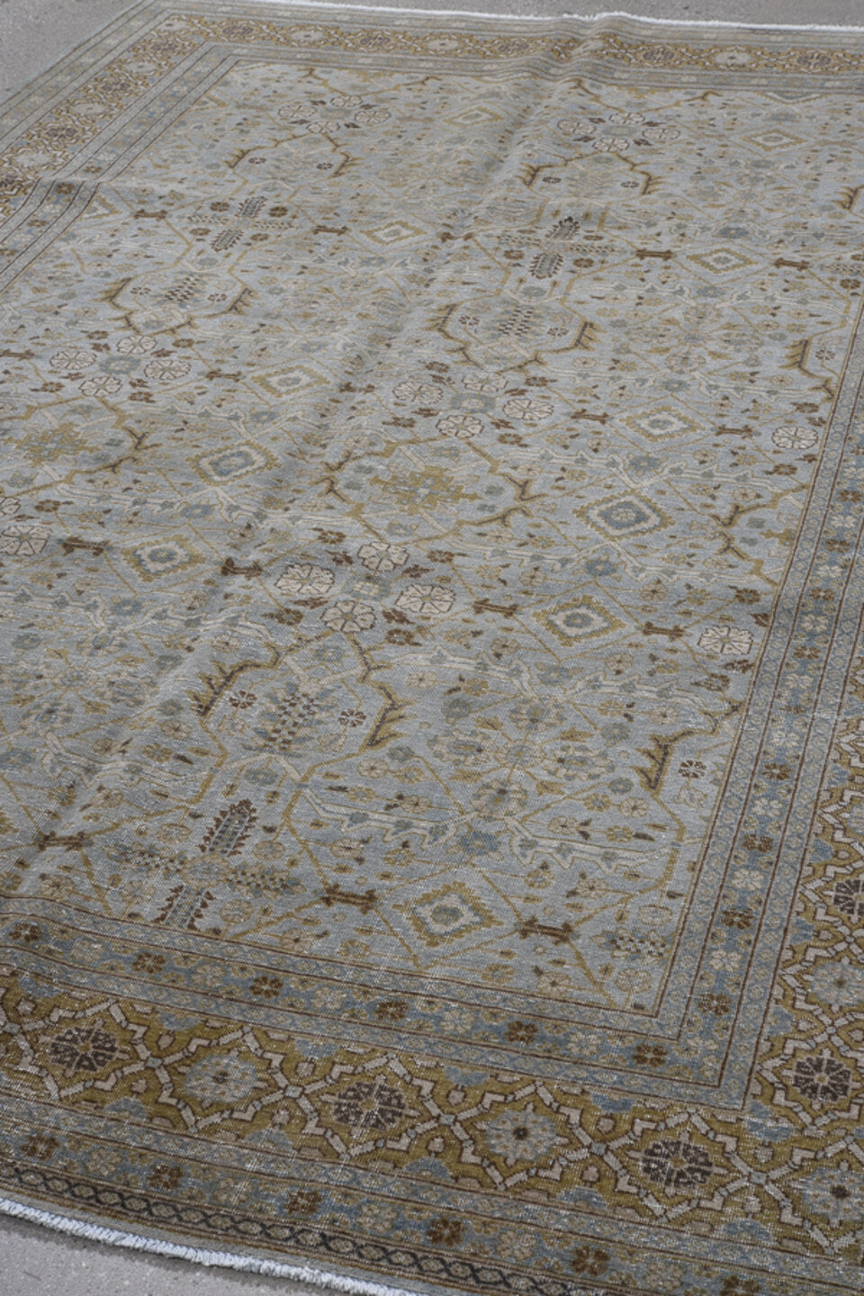 6' x 9' one-of-a-kind handmade vintage Tabriz medium size rug. Color palette: pale blue, taupe, ivory, brown, slate, camel