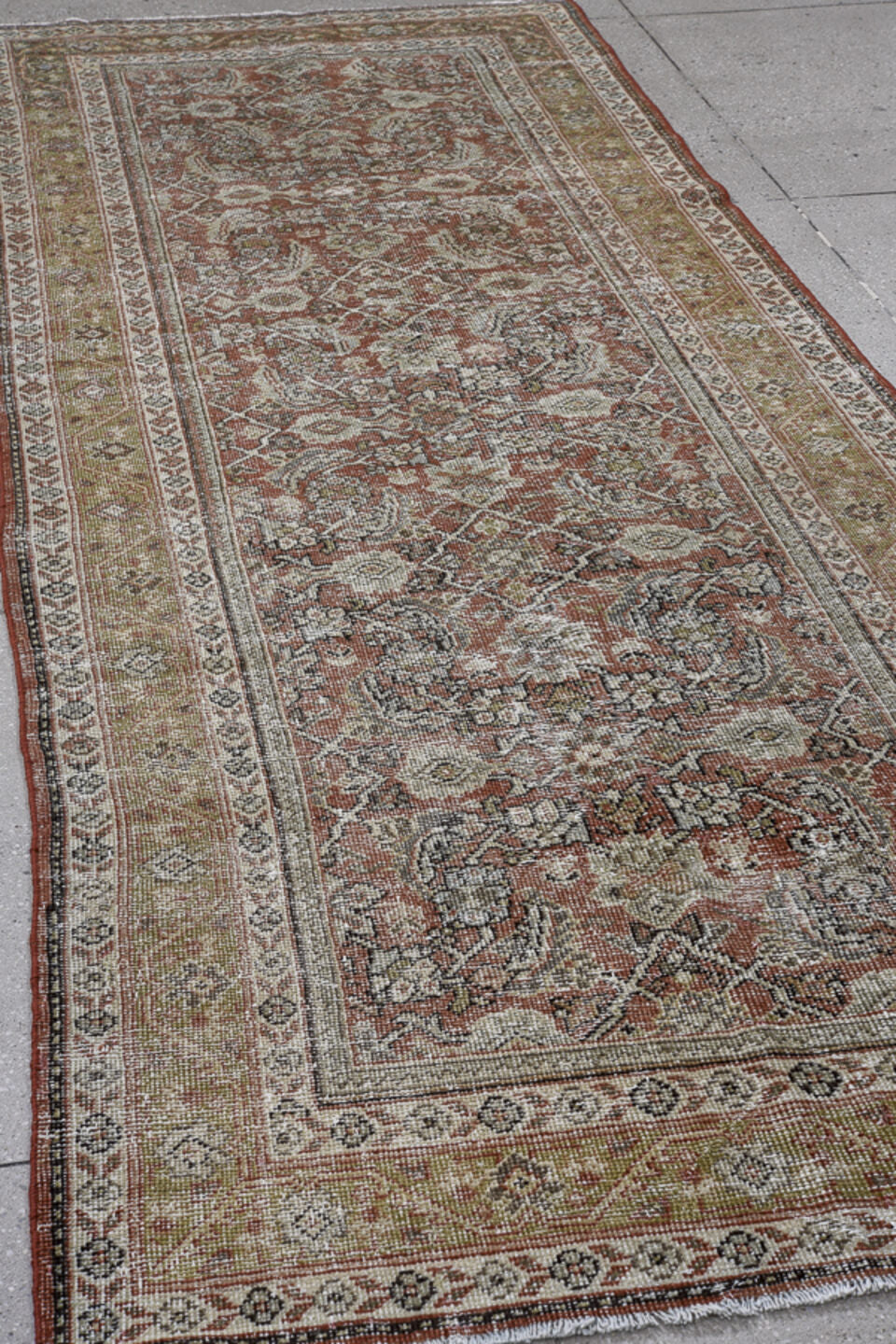 4' x 10' one-of-a-kind handmade vintage Mahal runner rug. Color palette: rust, ivory, taupe, sage, brown, charcoal