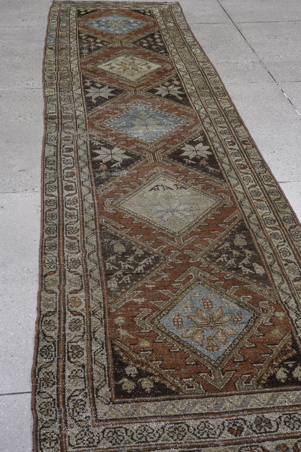 2' x 12' one-of-a-kind handmade vintage Malayer runner rug. Color palette: ivory, rust, sky blue, charcoal, taupe, brown