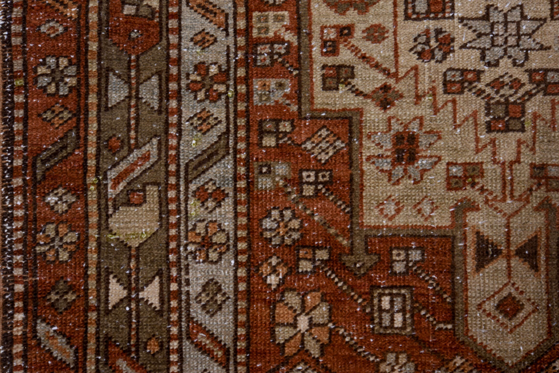 3' x 11' one-of-a-kind handmade antique Heriz runner rug. Color palette: rust, ivory, brown, taupe, charcoal, black, camel